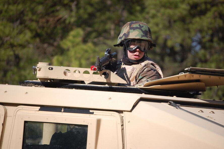 A student in the Advanced Contingency Skills Training Course participates in a scenario for convoy operations training on March 31, 2009, on a Fort Dix, N.J., range.  The course, taught by the U.S. Air Force Expeditionary Center's 421st Combat Training Squadron also on Fort Dix, prepares Airmen for upcoming deployments with advanced combat skills.  (U.S. Air Force Photo/Tech. Sgt. Scott T. Sturkol)
