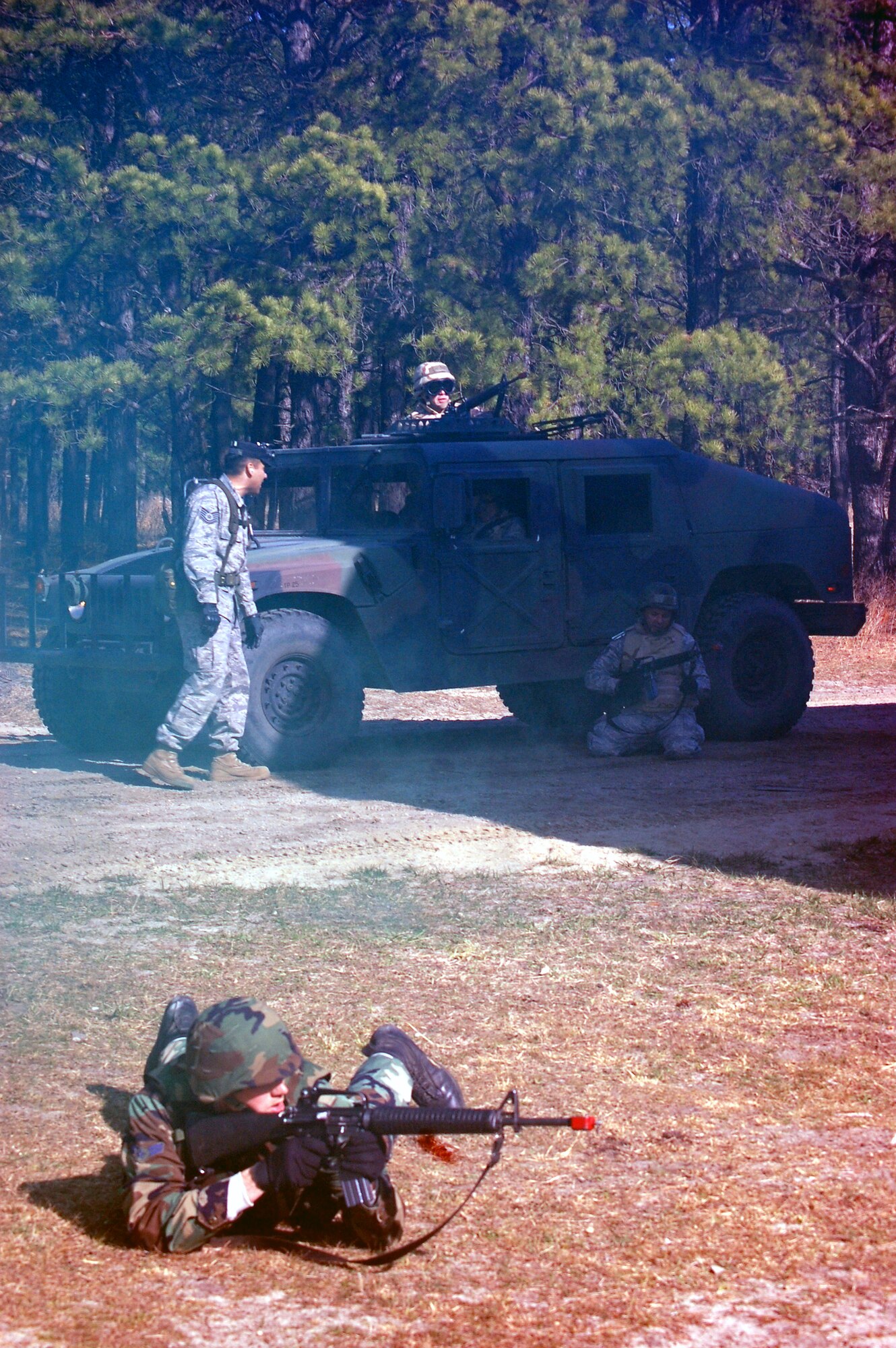 Students in the Advanced Contingency Skills Training Course participate in a scenario for convoy operations training on March 31, 2009, on a Fort Dix, N.J., range.  The course, taught by the U.S. Air Force Expeditionary Center's 421st Combat Training Squadron also on Fort Dix, prepares Airmen for upcoming deployments with advanced combat skills.  (U.S. Air Force Photo/Tech. Sgt. Scott T. Sturkol)