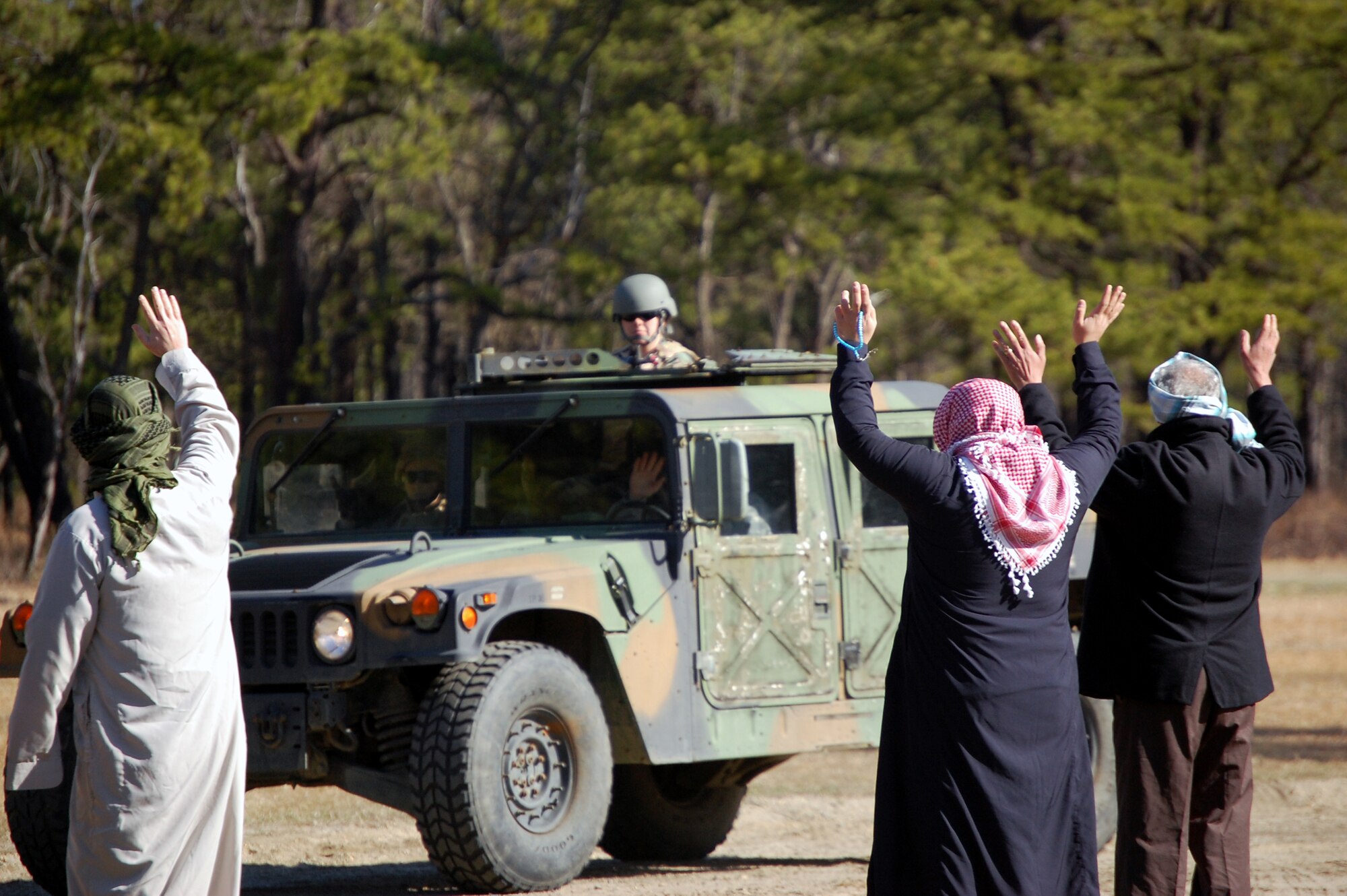 Students in the Advanced Contingency Skills Training Course participate in a scenario for convoy operations training on March 31, 2009, on a Fort Dix, N.J., range.  The course, taught by the U.S. Air Force Expeditionary Center's 421st Combat Training Squadron also on Fort Dix, prepares Airmen for upcoming deployments with advanced combat skills.  (U.S. Air Force Photo/Tech. Sgt. Scott T. Sturkol)