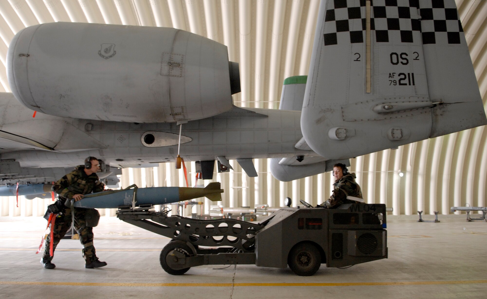 Weapons loaders unload munitions from an A-10 Thunderbolt II after landing at Osan Air Base, Republic of Korea, during Operational Readiness Exercise Beverly Bulldog 09-02, March 31. The pre-scheduled exercise is designed to help the 51st Fighter Wing prepare for their Operational Readiness Inspection in April. (U.S. Air Force photo/Staff Sgt. Brian Ferguson)