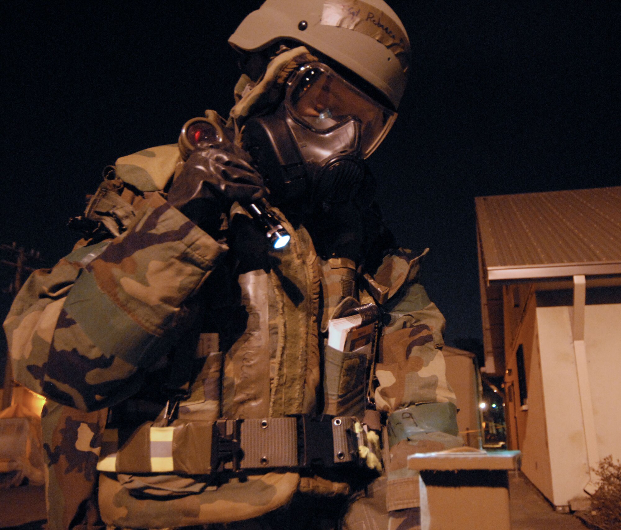 Tech. Sgt. Rebecca Fluck, 8th Operations Group, conducts a post attack reconnaissance sweep at Kunsan Air Base, Republic of Korea, April 1, 2009. Kunsan Airmen are currently participating in Beverly Bulldog 09-02, in preparation for an upcoming Operational Readiness Inspection. (U.S. Air Force Photo/Senior Airman Gustavo Gonzalez)
