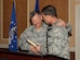 LANGLEY AIR FORCE BASE, Va. -- Brig. Gen. Mark A. Barrett, 1st Fighter Wing commander, presented Tony Dungy's book "Quiet Strength" to Chaplain (Brig. Gen.) David H. Cyr, Air Force Deputy Chief of Chaplains, March 31. The National Prayer Breakfast provides an opportunity for Airmen to reaffirm the moral and spiritual values upon which our nation was founded. (U.S. Air Force photo/Airman 1st Class Gul Crockett)