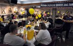 Spouses and family members of deployed servicemembers were honored with a free dinner at the dining facility on March 26 to thank them for their sacrifice and allow them to share experiences with other family members. (U.S. Air Force photo by Steve White)