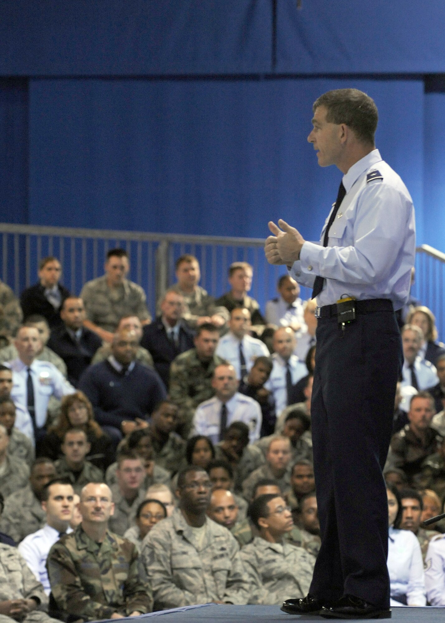 LANGLEY AIR FORCE BASE, Va. -- Brig. Gen. Mark A. Barrett, 1st Fighter Wing commander, speaks to Airmen during a commander's call here March 30.  General Barrett, recognized outstanding achievements of Airmen, spoke of the upcoming Operational Readiness Inspection, and  answered questions about joint basing, safety, and family support from wing members in attendance.  (U.S. Air Force photo/Airman 1st Class Jonathan Koob)