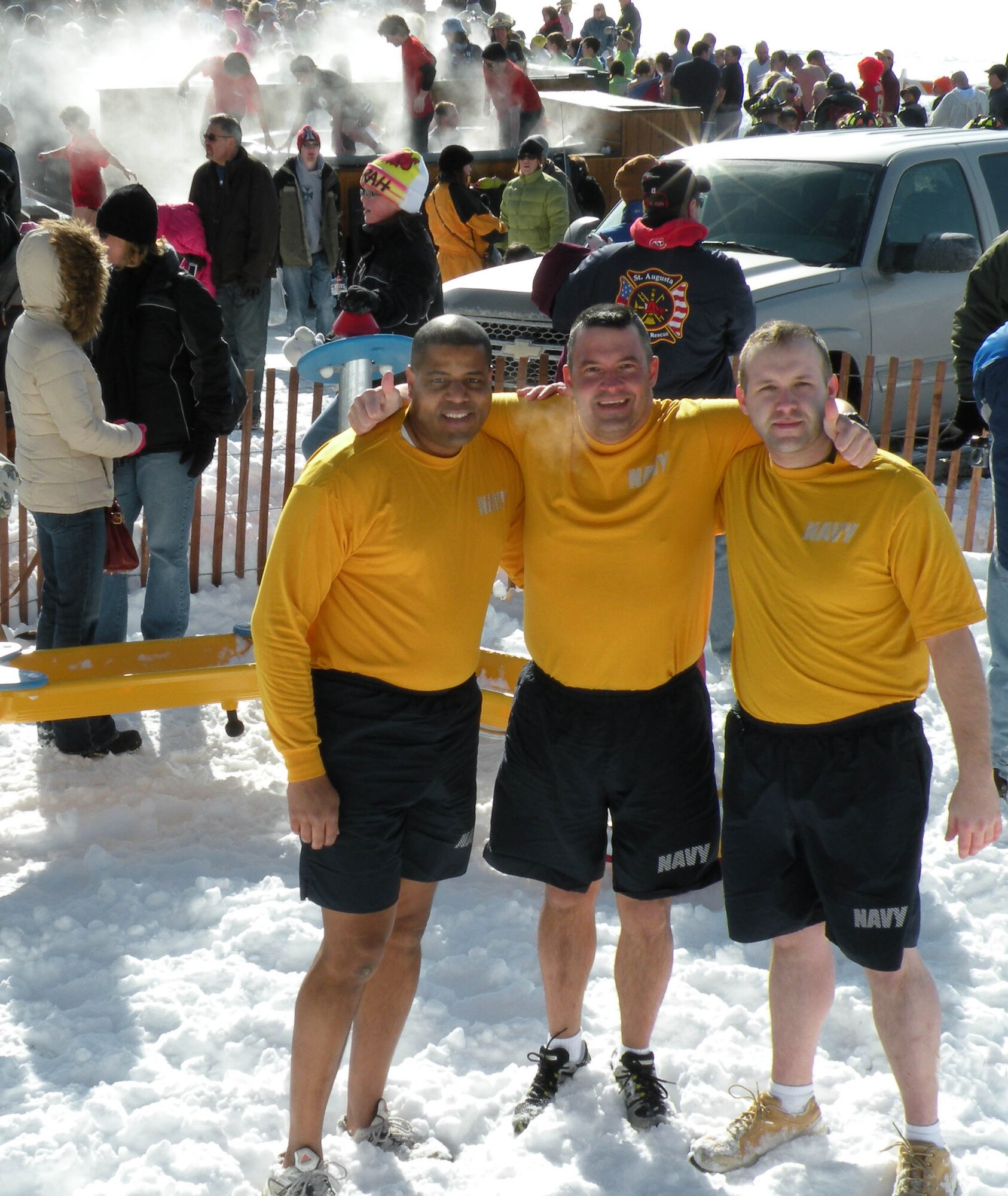 Three members of the Navy Operational Support Center - Minneapolis  joined seven of their Marine colleagues for a brisk swim on Feb. 28. 
Braving 18 degree high temperatures and calling themselves the ?Polar Headcases,? the team joined others at the Crystal Lake Beach in Burnsville, Minn., to ?take the plunge? fora  very worthy cause - Special Olympics. The NOSC-Minneapolis ?Polar Headcases? are (left to right) HMC Eddie Fitzpatrick, YNC (AW) Rich Cole and AE2 (AW) Anthony Beguhl. (Courtesy photo)                              