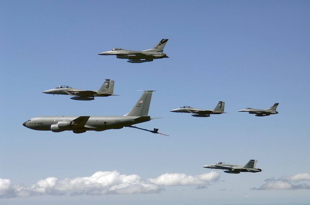 Fighters waiting to be refueled from 141ARW KC-135R from Fairchild AFB WA