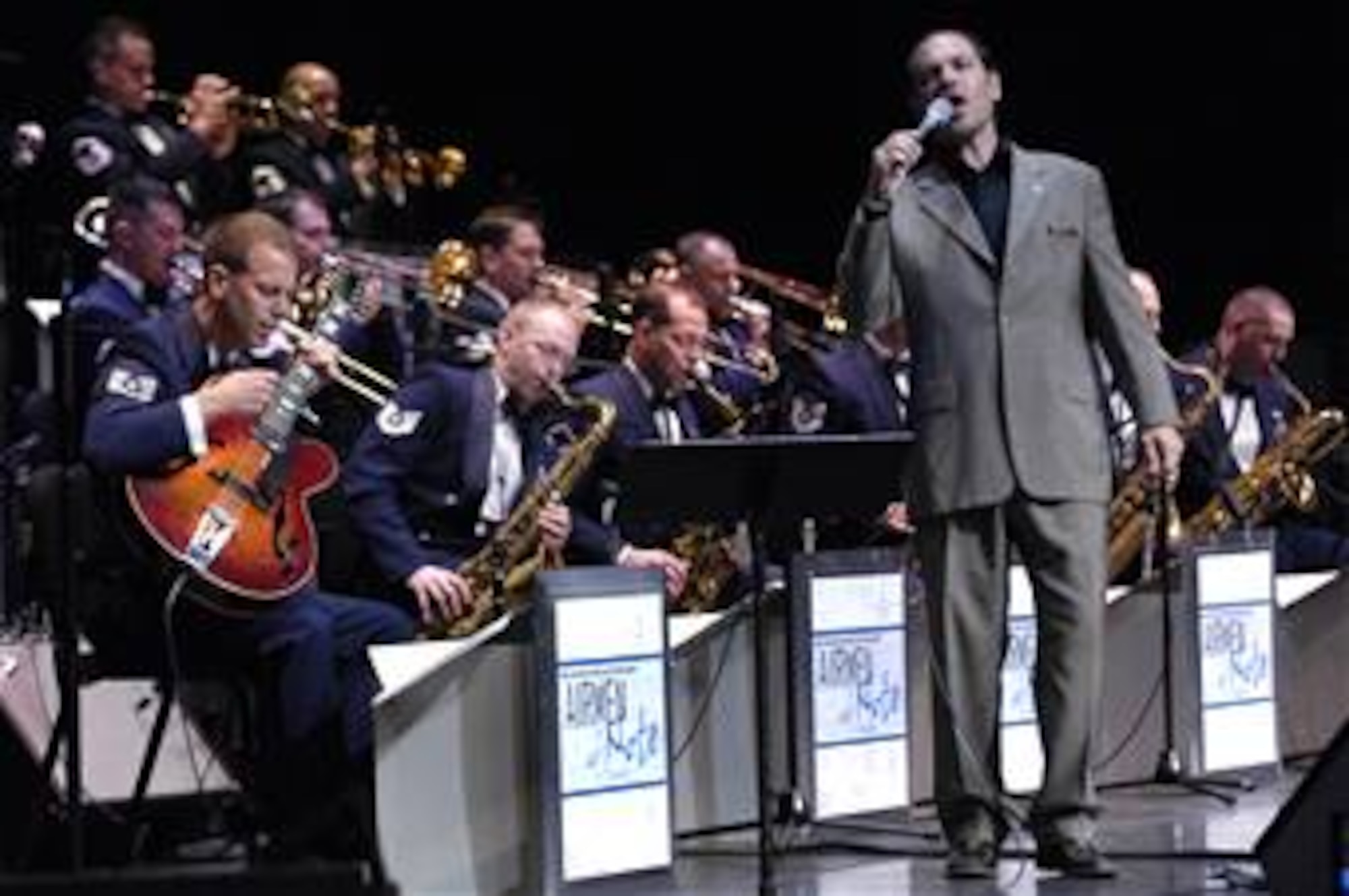 Guest artist Kurt Elling performs with the U.S. Air Force Band's Airmen of Note Sept. 6, 2008 at Lisner Auditorium. Mr. Elling and the Airmen of Note opened the Band's 2008 Jazz Heritage Series. Radio listeners can hear performances by The U.S. Air Force Band and other guest artists by logging on to www. usafband.mil/jhsbroadcasts. (U.S. Air Force photo by Senior Airman Dan DeCook)