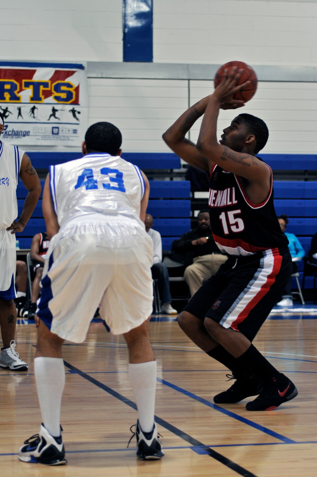 Zaire Jackson, a RAF Mildenhall Forward shoots a free throw March 26, 2009 at RAF Lakenheath, England. Teams from six bases in USAFE participated in the championships. (U.S. Air Force photo by Airman 1st Class Perry Aston) 
