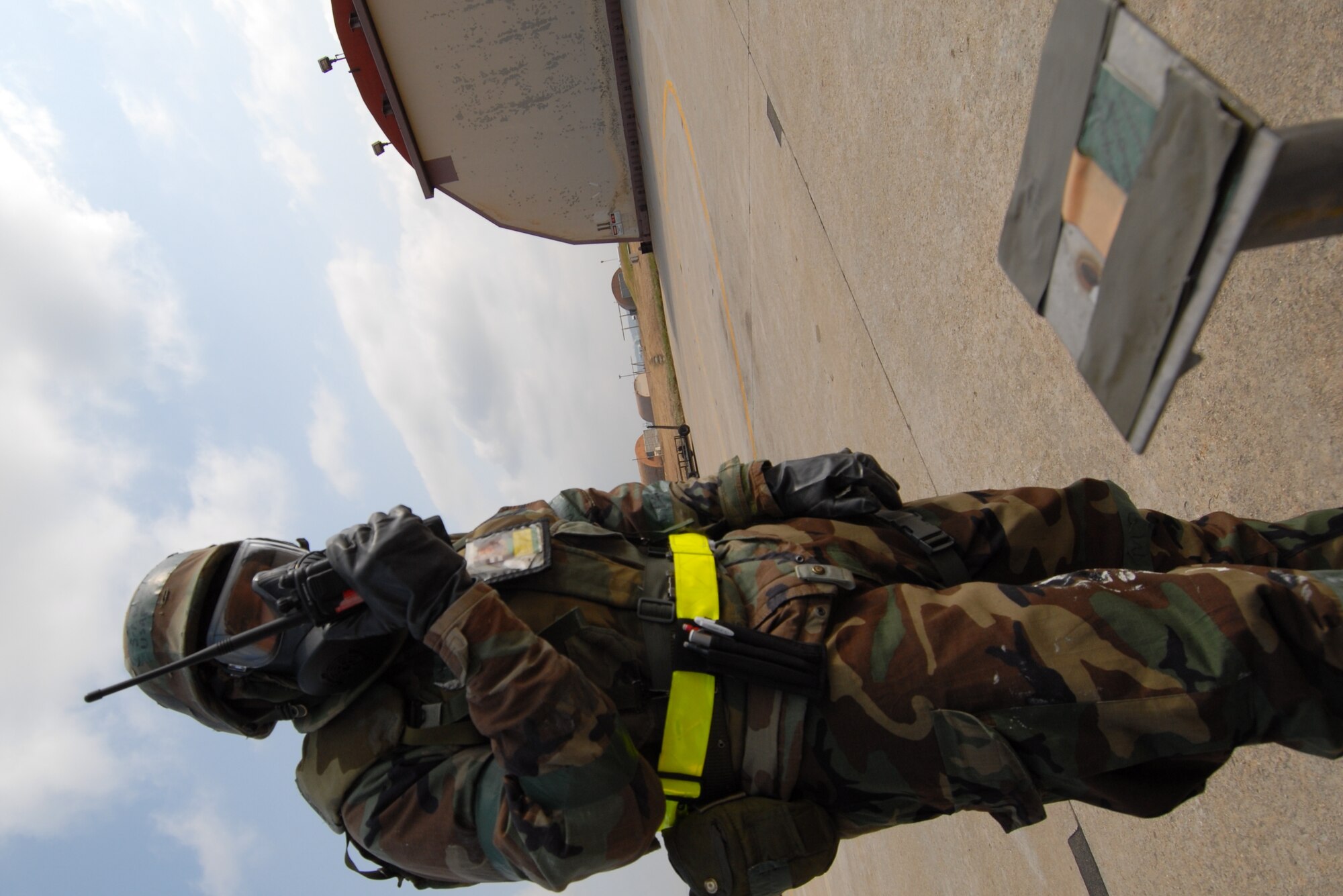 Senior Airman Michael Rodriguez, 8th Maintenance Squadron, reports M-8 paper condition to his Unit Control Center while performing Post Attack Reconnaissance  checks at Kunsan Air Base, Republic of Korea, March 31, 2009. Kunsan Airmen are currently participating in the peninsula-wide Operational Readiness Exercise Beverly Bulldog 09-02 in preparation for an upcoming Operational Readiness Inspection. (U.S. Air Force Photo by Master Sgt. John M. Foster)