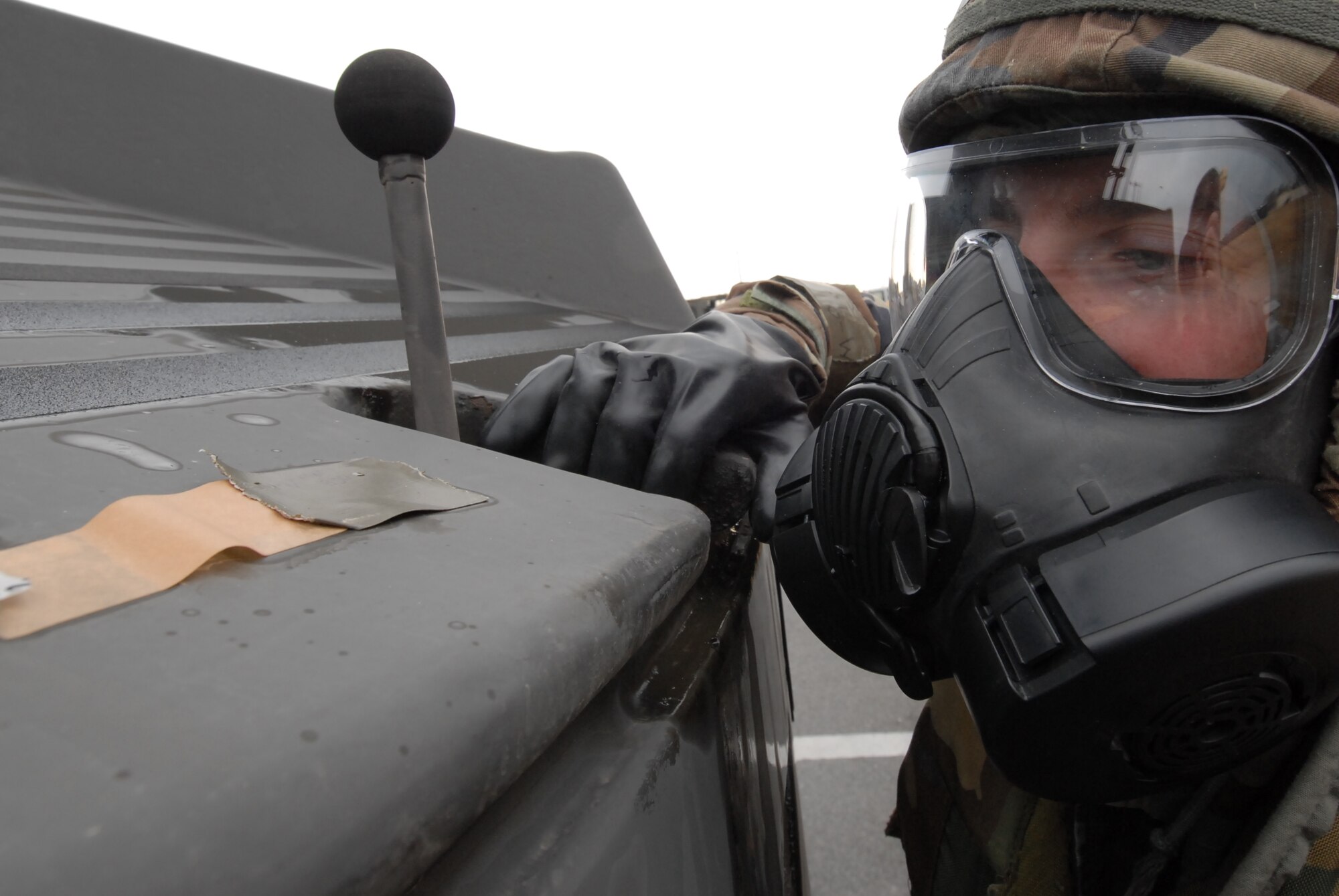 Senior Airman Jason Landis 8th Maintenance Squadron, prepares to change out M-8 paper and report to his Unit Control Center while performing Post Attack Reconnaissance checks at Kunsan Air Base, Republic of Korea, March 31, 2009. Kunsan Airmen are currently participating in the peninsula-wide Operational Readiness Exercise Beverly Bulldog 09-02 in preparation for an upcoming Operational Readiness Inspection. (U.S. Air Force Photo by Master Sgt. John M. Foster)

