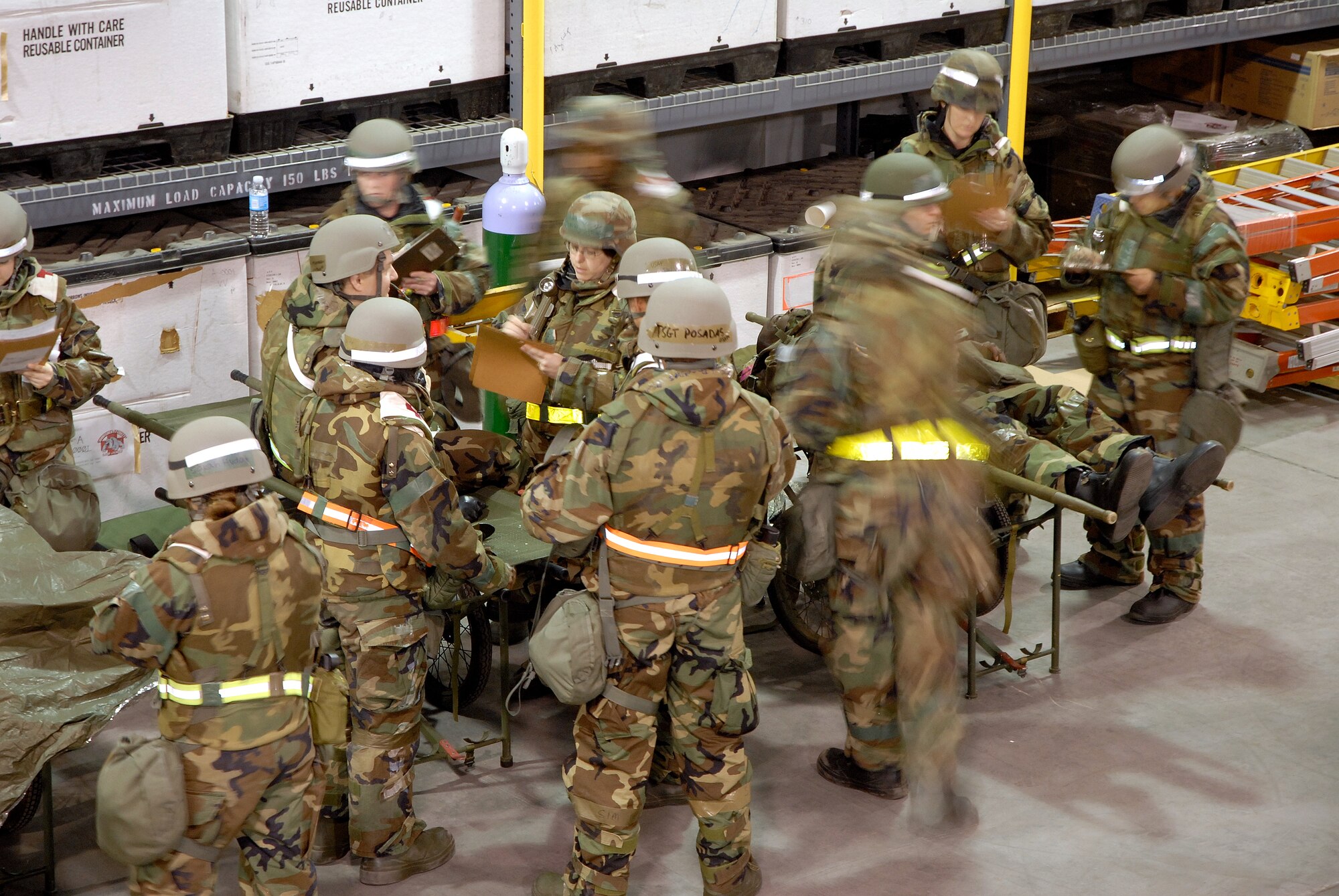 Members of the 8th Medical Group rush to the assistance of casualty roleplayers at Kunsan Air Base, Republic of Korea, March 31, 2009. Kunsan Airmen are currently participating in the peninsula-wide Operational Readiness Exercise Beverly Bulldog 09-02 in preparation for an upcoming Operational Readiness Inspection. (U.S. Air Force Photo by Staff Sgt. Jason Colbert)

