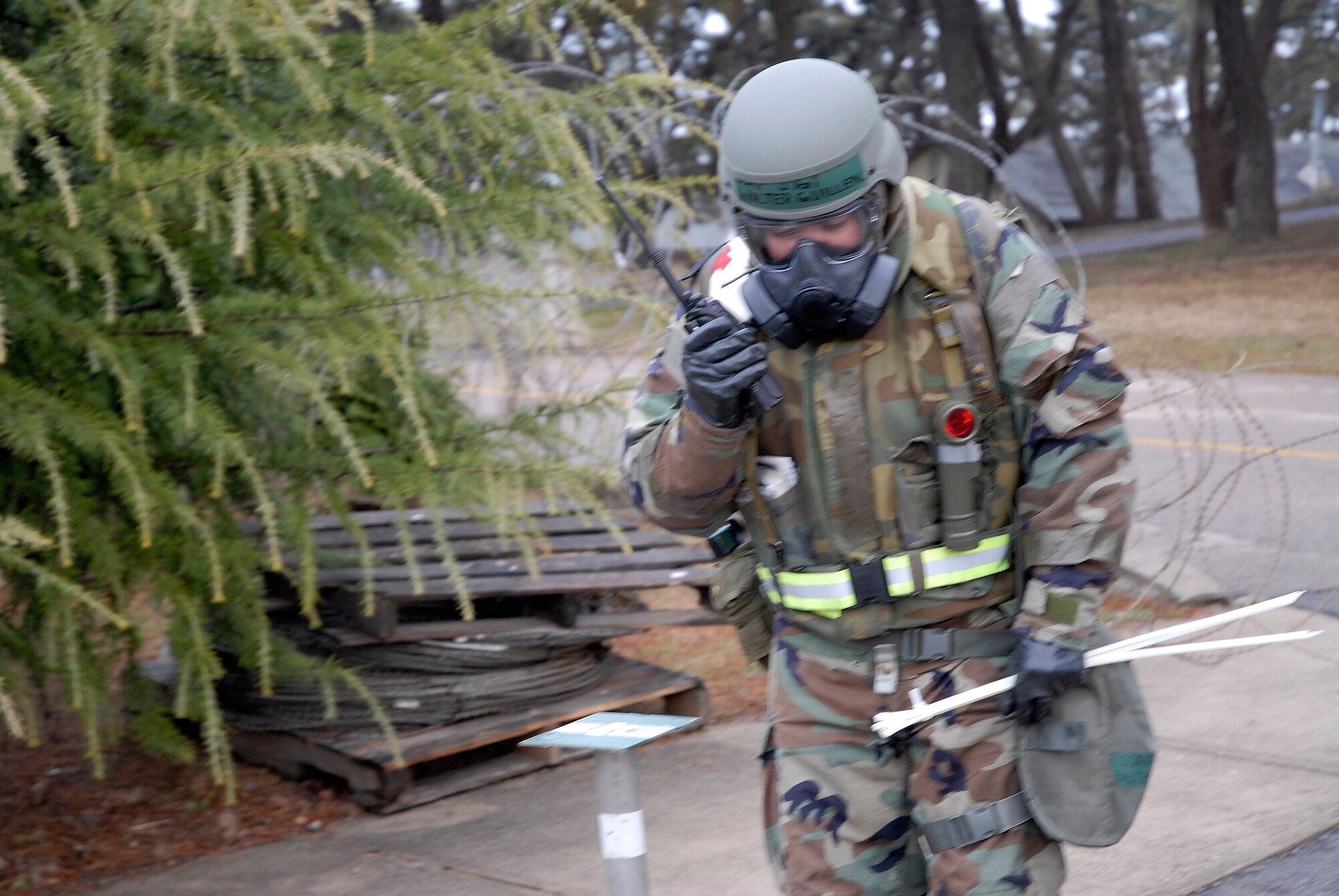 Staff Sgt Walter Guillen, 8th Medical Support Squadron, performs a post attack reconnaissance sweep wearing Mission Oriented Protective Posture 4 after a missile attack at Kunsan Air Base, Republic of Korea, March 31, 2009. Kunsan Airmen are currently participating in the peninsula-wide Operational Readiness Exercise Beverly Bulldog 09-02 in preparation for an upcoming Operational Readiness Inspection. (U.S. Air Force Photo by Staff Sgt. Jason Colbert)

