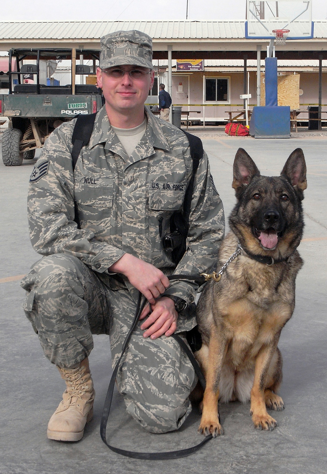 CAMP BUCCA, Iraq -- Staff Sgt. Joseph Null, 42nd Military Police Brigade military working dog handler, is deployed from the 52nd Security Forces Squadron at Spangdahlem Air Base, Germany. (U.S. Air Force courtesy photo)
