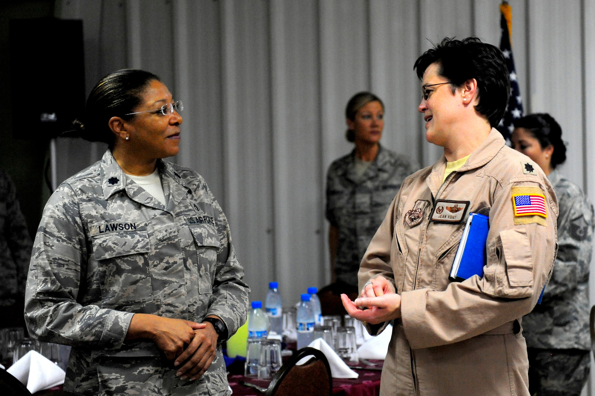 Lt. Col. Theresa Lawson, 380 Expeditionary Medical Group Mental Health chief and Lt. Col. Jeanette Voigt, 908 Expeditionary Air Refueling Squadron commander shared their experiences as panel members during the 380 AEW Women's History Month symposium luncheon here. Colonel Lawson is deployed from Sheppard AFB, Texas and Colonel Voigt is deployed from McGuire AFB, N.J. (U.S. Air Force photo by Capt. Jennifer Pearson) (Released)