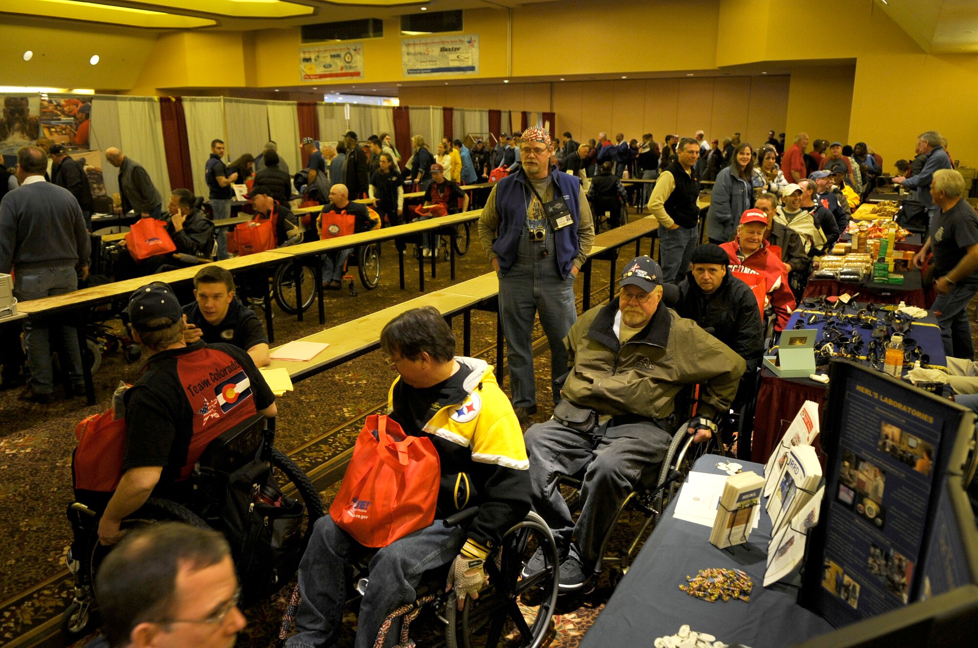 Participants line up inside The Silver Tree Hotel March 29 to register for the 23rd National Disabled American Veterans Winter Sports Clinic in Snowmass Village, Colo. The event is sponsored by the Department of Veterans Affairs and Disabled American Veterans. (U.S. Air Force photo/Staff Sgt. Desiree N. Palacios)