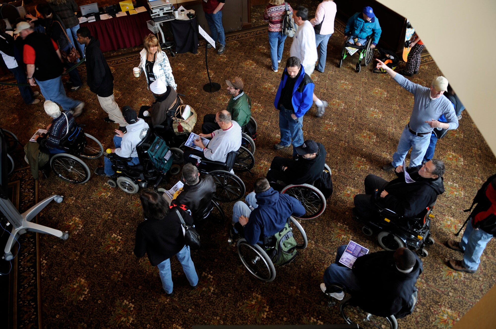 Participants line up inside The Silver Tree Hotel March 29 to register for the 23rd National Disabled American Veterans Winter Sports Clinic in Snowmass Village, Colo. The event is sponsored by The Department of Veterans Affairs and Disabled American Veterans. (U.S. Air Force photo/Staff Sgt. Desiree N. Palacios)