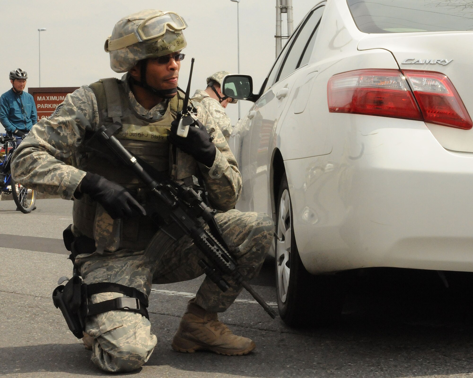 YOKOTA AIR BASE, Japan --  Staff Sgt. Joseph Blake, 374th Security Forces Squadron, secures the area around the PAX terminal March 31 during Phase I of Exercise Beverly Morning 09-03. Yokota is conducting an exercise March 30 through April 3 to maintain operational readiness. (U.S. Air Force photo/Airman 1st Class Michael Dillon)