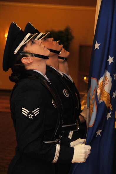 MISAWA AIR BASE, Japan -- Members of an all-female Honor Guard post colors during a Women's History Month observance breakfast March 27, 2009. The breakfast included poem readings, skits, and speeches by Airman 1st Class Sylvia Flores and Chief Master Sgt. Lisa Kuehnl. (U.S. Air Force photo by Senior Airman Jamal D. Sutter)