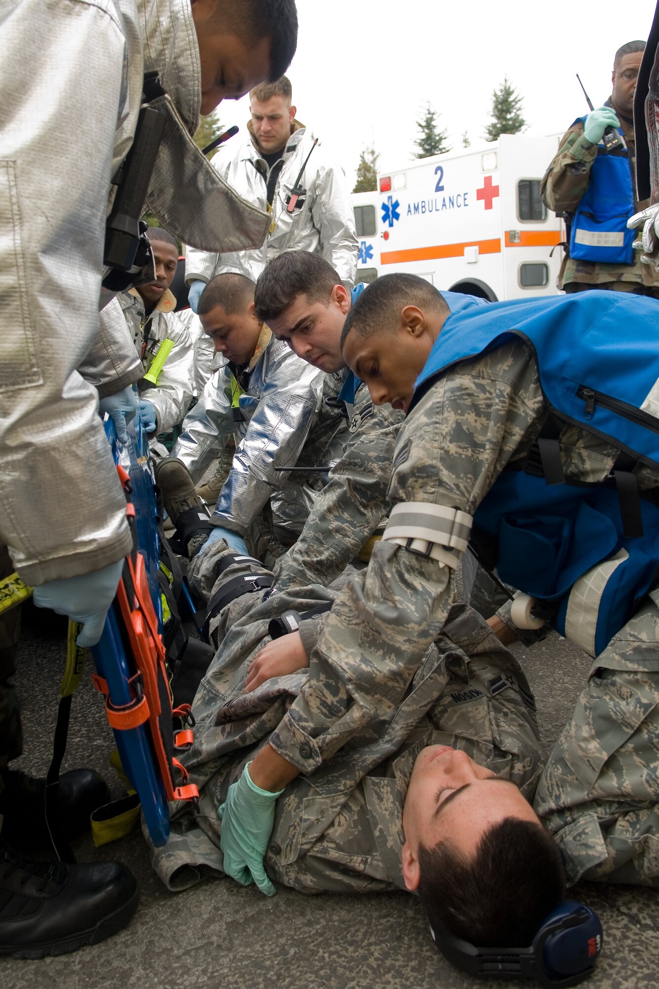 YOKOTA AIR BASE, Japan -- Yokota Fire Department and Emergency Response Personnel respond to a simulated 10K forklift accident site March 31 during Phase I of Exercise Beverly Morning 09-03. Yokota is conducting an exercise March 30 through April 3 to maintain operational readiness.(U.S. Air Force photo/Osakabe Yasuo)