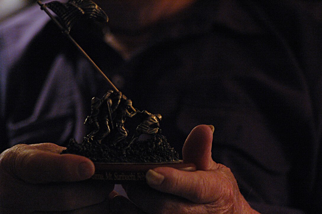 During a 2008 Marine Corps ball, this Iwo Jima flag raising replica was presented to Kenneth H. Stevenson, an 84-year-old veteran who fought as a platoon sergeant with the 27th Marine Regiment, 5th Marine Division in 1945. Stevenson, who joined the Marine Corps in December 1941, shared his story with Marines and sailors at Marine Corps Air Station Yuma, Ariz. Stevenson, a Kelso, Wash., native, has been a part-time Yuma resident since 1986.