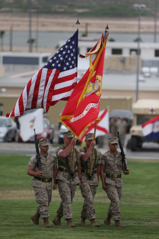The Color Guard Marines of 2nd Battalion, 7th Marine Regiment, march the colors onto Lance Cpl. Torrey L. Gray Field during the memorial ceremony of Maj. Lee G. Helton, the executive officer of 2/7, May 1. Helton was killed in a motorcycle accident April 28.