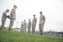 Marines receive awards in front of more than 400 poolees during the Recruiting Station Des Moines annual field meet May 1-2 here. The awards ceremony was an added portion to this year's annual field meet to show poolees what it's like to receive an award in a formation. (U.S. Marine Corps photo by Sgt. Bryan A. Peterson)