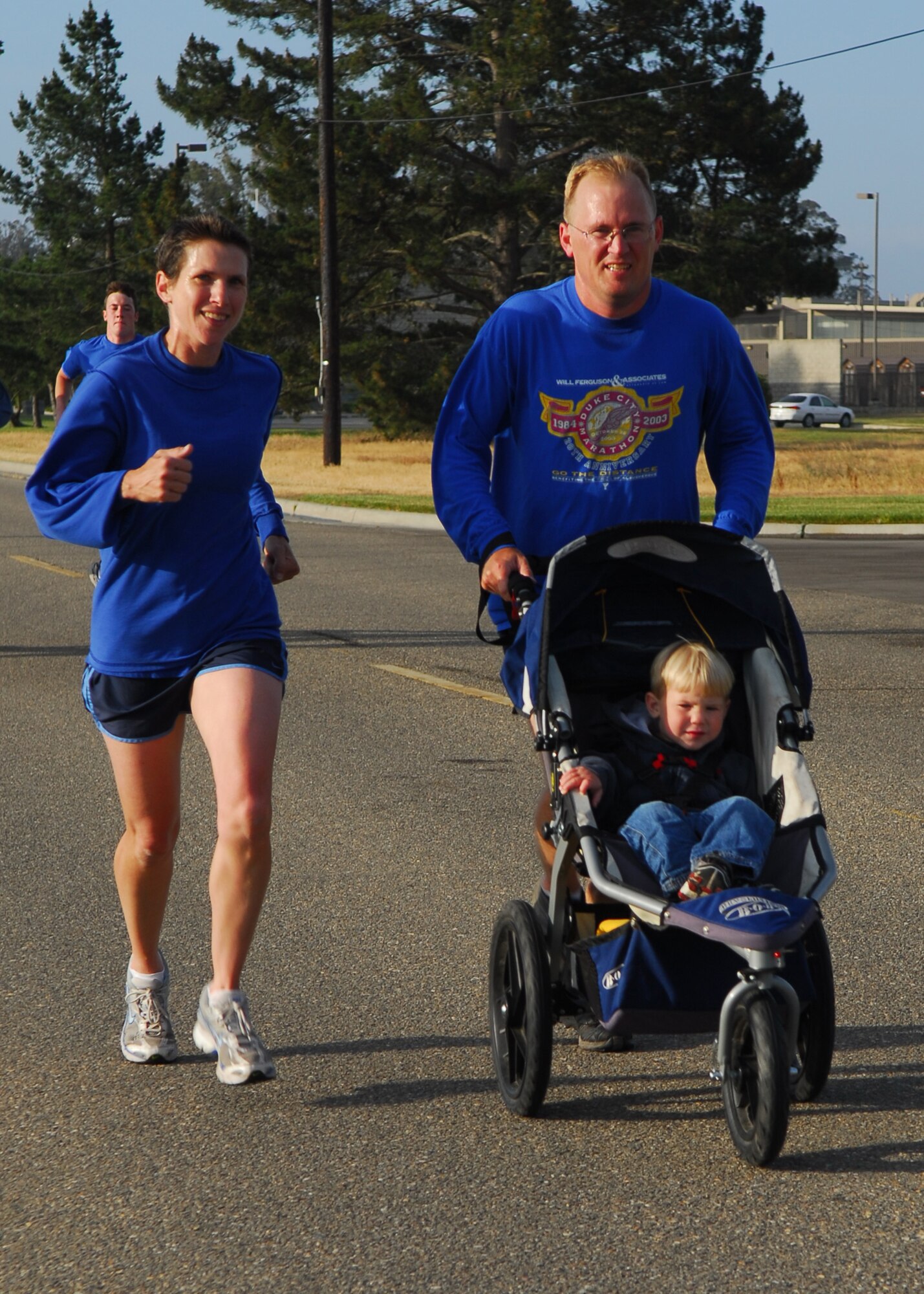 VANDENBERG AIR FORCE BASE, Calif.-- Staff Sgt. Micky Sederberg of the 533 training squadron and his family participate in the monthly wing run at the parade grounds here April 30. Sergeant Sederberg and his family show support of  the child abuse and domestic violence program by wearing blue. (U.S. Air Force photo/Airman 1st Class Kerelin Molina)
