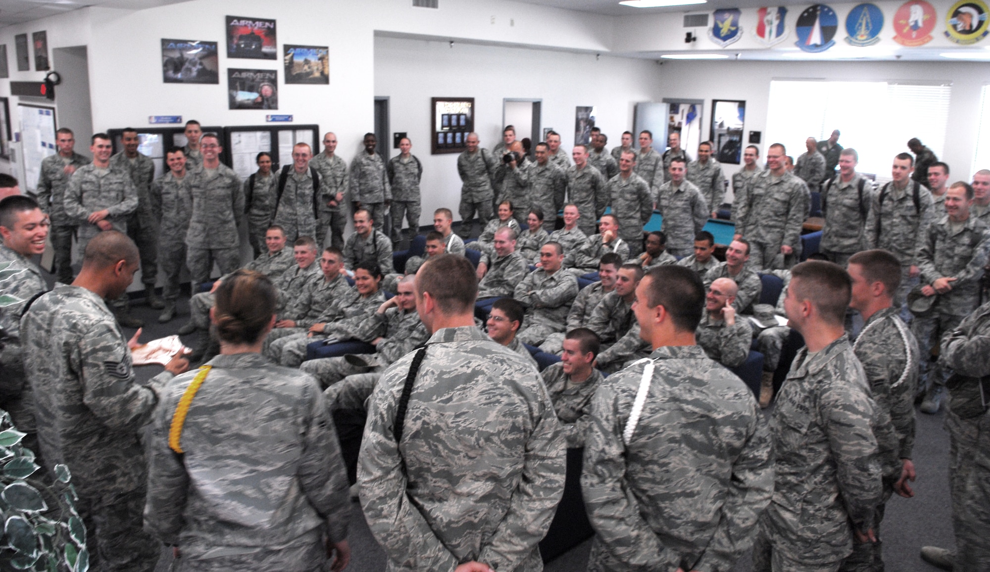 VANDENBERG AIR FORCE BASE, Calif. -- Military training leaders and Airmen of the 381st Training Group gather for a briefing at the end of the duty day here April 25.  Airmen's Time allows MTL's the opportunity to teach Airmen about military life. (U.S. Air Force photo/Senior Airman Christopher Hubenthal)
