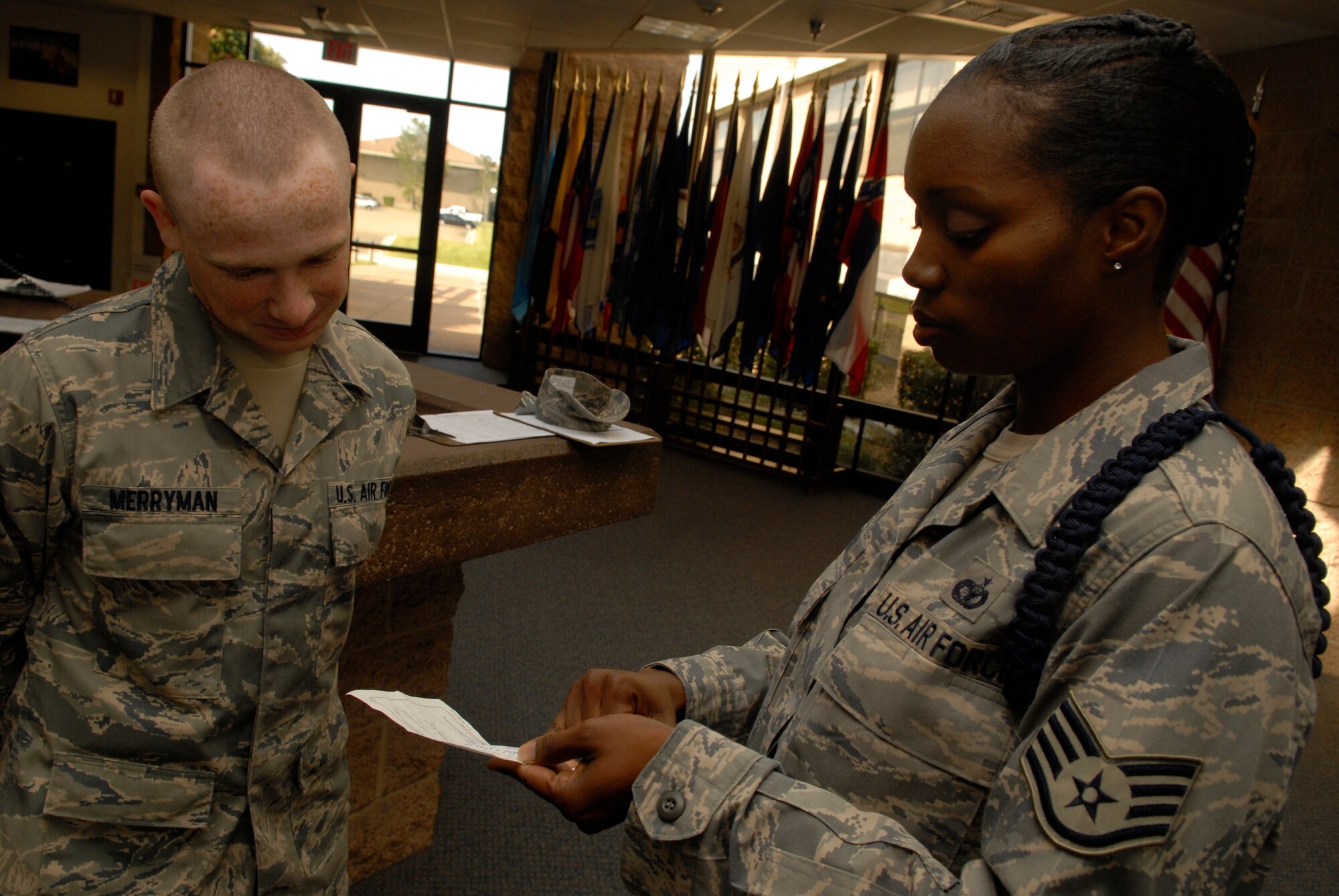VANDENBERG AIR FORCE BASE, Calif. -- Staff Sgt. Jerilyn Watson, a 381st Training Support Squadron military training leader, reads a Form 341 from Airman 1st Class Jeremy Merryman, a 532nd Training Squadron student, May 1. A 341 is the primary method Air Force technical schools use to document discrepancies and excellence. (U.S. Air Force photo/Senior Airman Christian Thomas)
