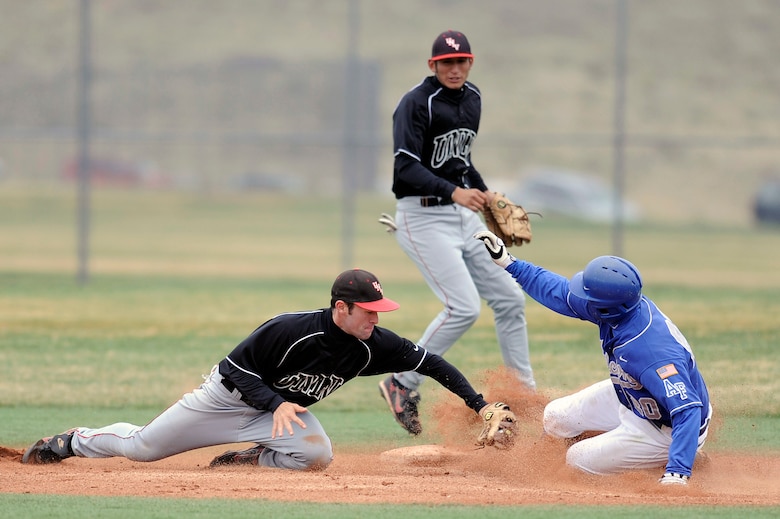U.S. Air Force Academy sophomore second baseman Jon McMahon slides safely into second base during the 20-13 loss to the University of Nevada, Las Vegas at Falcon Field April 25 at the Academy in Colorado Springs, Colo. The loss dropped Air Force to 14-25 overall, with a Mountain West Conference record of 3-8. (U.S. Air Force photo/Mike Kaplan)
