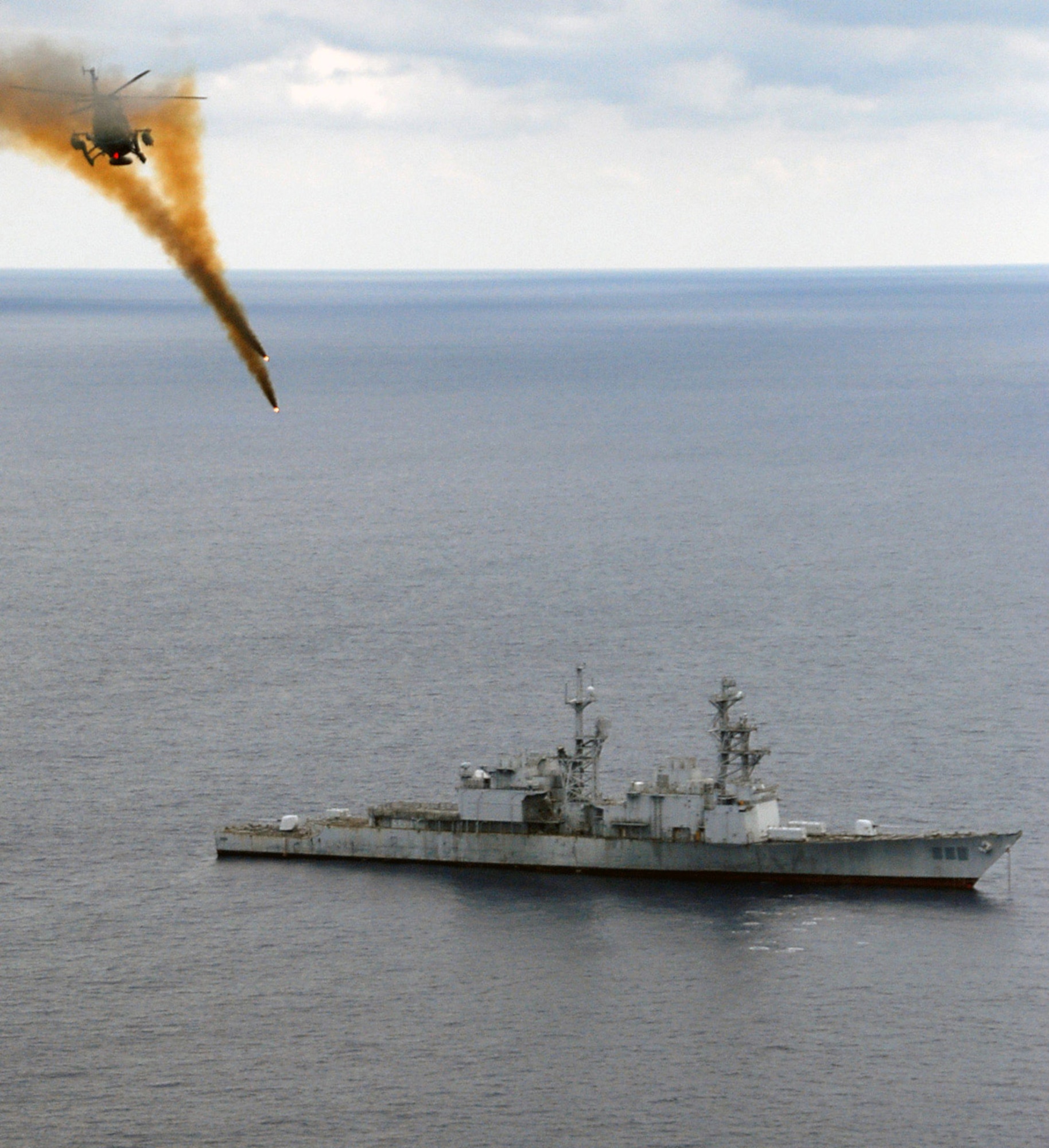ATLANTIC OCEAN (April 29, 2009) -- A Mexican BO-105 Bolkow helicopter fires 2.75" high explosive rockets at the ex-USS Connolly (DD 979) during the sinking exercise portion of UNITAS Gold. This year marks the 50th iteration of UNITAS, a multinational exercise that provides opportunities for participating nations to increase their collective ability counter illicit maritime activities that threaten regional stability. Participating countries are Brazil, Canada, Chile, Colombia, Ecuador, Germany, Mexico, Peru,the United States and Uruguay. U.S. Navy Photo by LT Chris Brown)