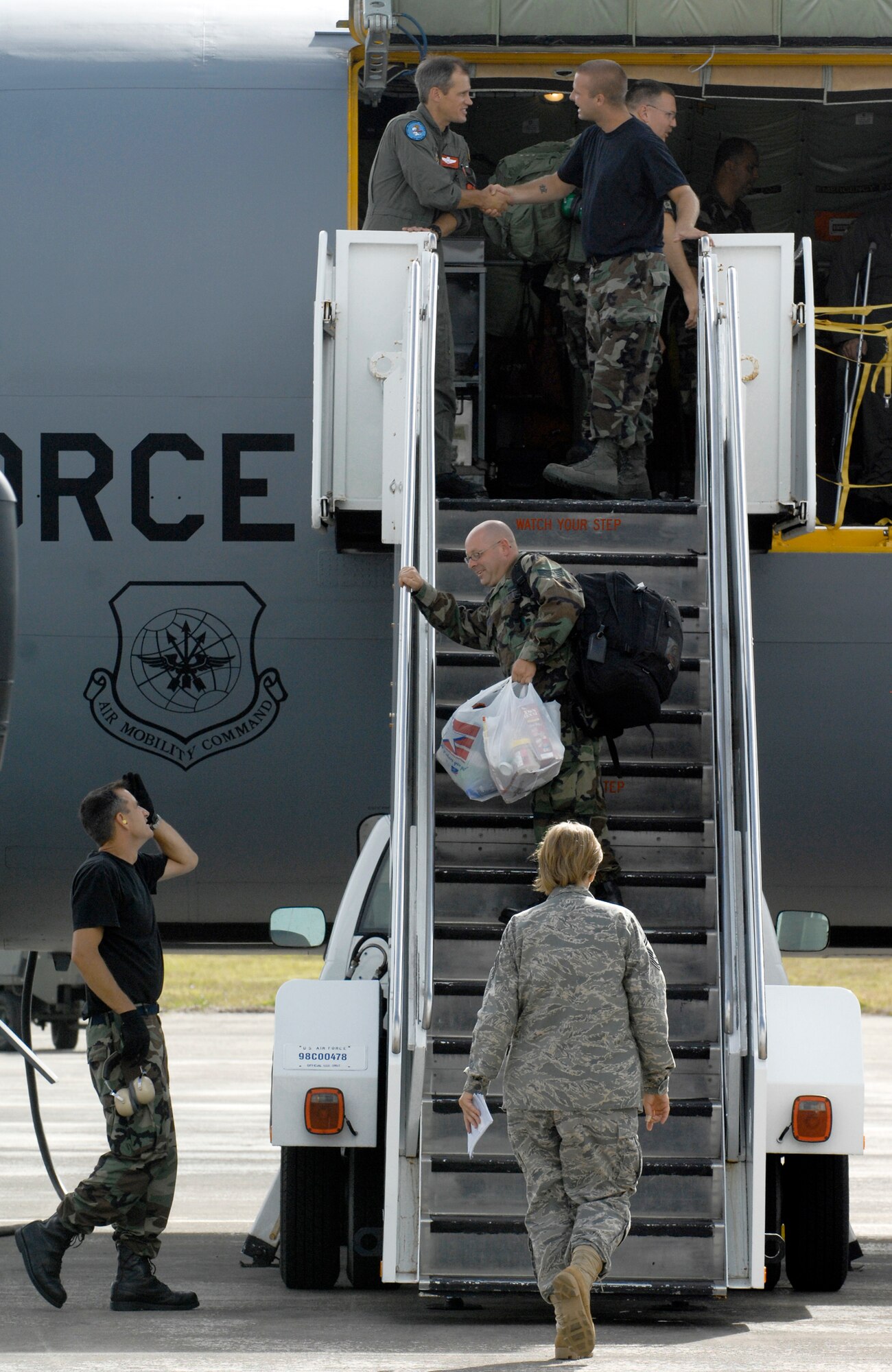 Members from the 434th Air Refueling Wing from Grissom Air Reserve Base, Ind., board a KC-135 Stratotanker April 29 at Andersen Air Force Base, Guam. Members of the 434th ARWing completed a deployment in support of Pacific refueling operations. (U.S. Air Force photo/Master Sgt. Kevin J. Gruenwald) 
