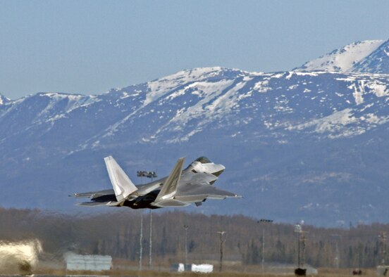 ELMENDORF AIR FORCE BASE, Alaska -- An F-22A Raptor from the 525th Fighter Squadron takes off April 30. This exercise enables flying squadrons to enhance their fighting capabilities in simulated combat sorties in a realistic threat environment. (U.S. Air Force photo/Senior Airman Laura Turner)