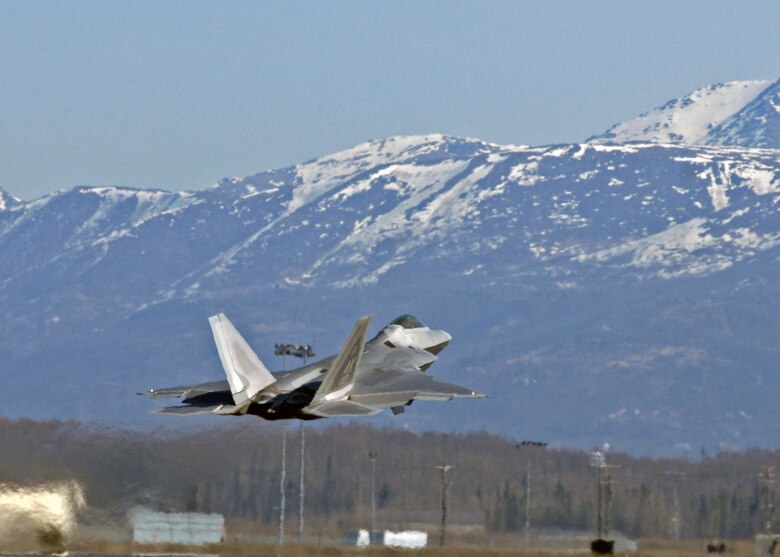 ELMENDORF AIR FORCE BASE, Alaska -- An F-22A Raptor from the 525th Fighter Squadron takes off April 30. This exercise enables flying squadrons to enhance their fighting capabilities in simulated combat sorties in a realistic threat environment. (U.S. Air Force photo/Senior Airman Laura Turner)