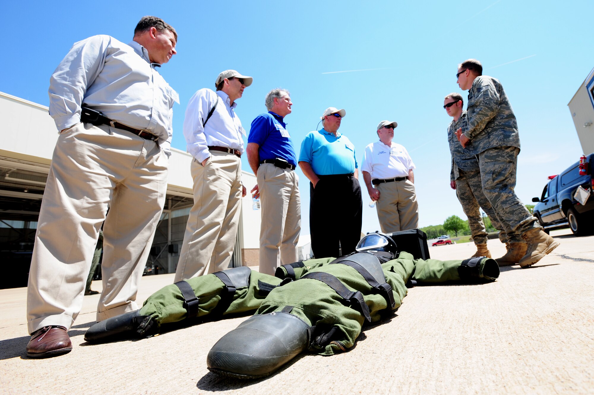Civic leaders from Pope Air Force Base visit with Explosive Ordinance Disposal Airmen during a tour on base April 23. Leadership and community supporters from Pope AFB experienced several aspects of the base to include flight simulators, K-9 Unit demonstration and the teamwork between the three wings that completes the day-to-day Little Rock C-130 mission.