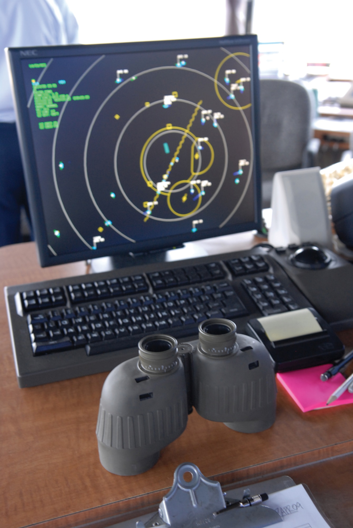 Constantly moving radar screens and binoculars are spread out in the air traffic control tower at Luke Air Force Base. The tower will not only be looked at for the UCI but also for a secondary inspection known as the Air Traffic System Evaluation Program. (U.S. Air Force photo/ Deborah Silliman Wolfe.)
