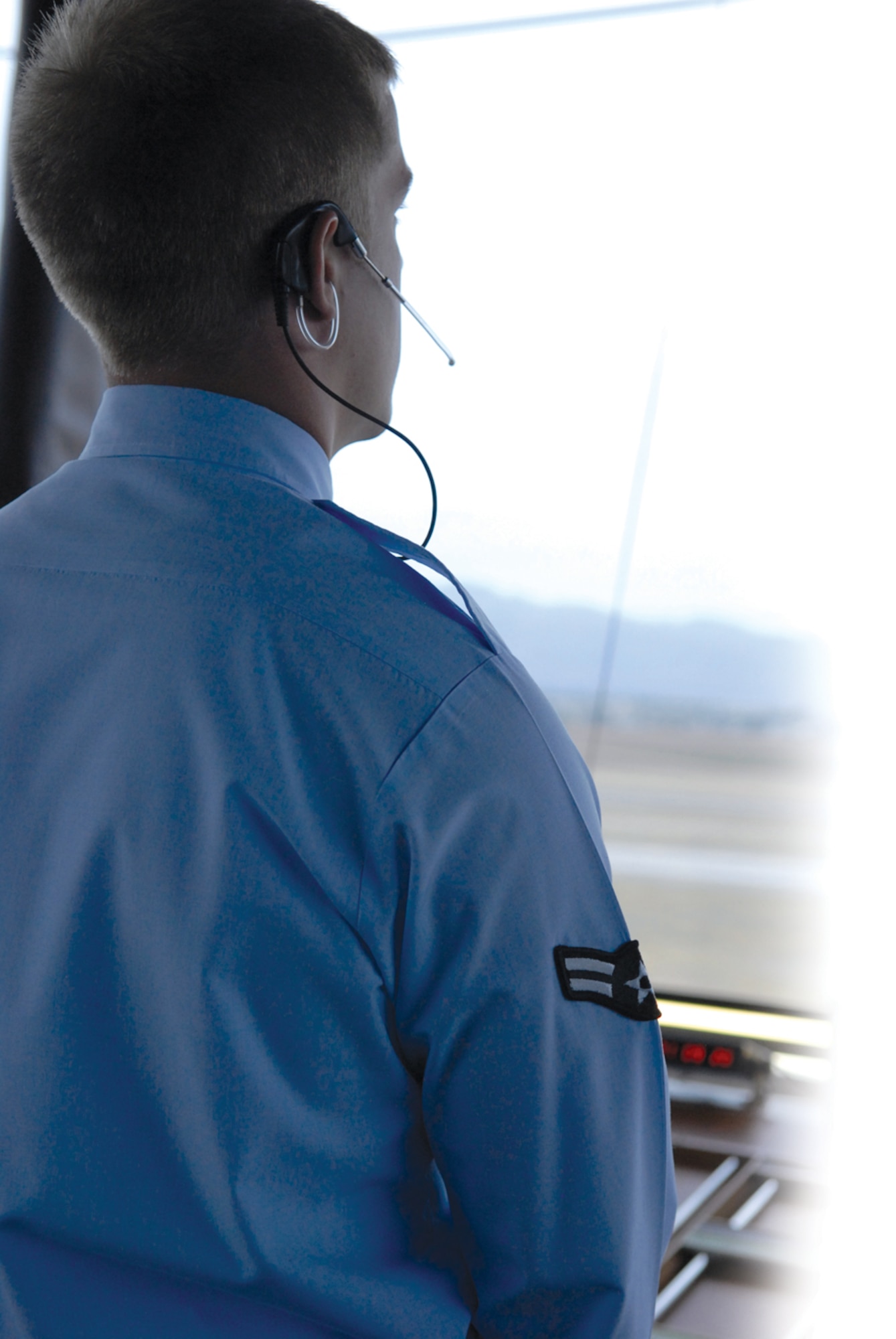 Airman 1st Class Sean Bunten, 56th Operations Support Squadron air traffic controller apprentice, works local control Monday. (U.S. Air Force photo/ Deborah Silliman Wolfe.)