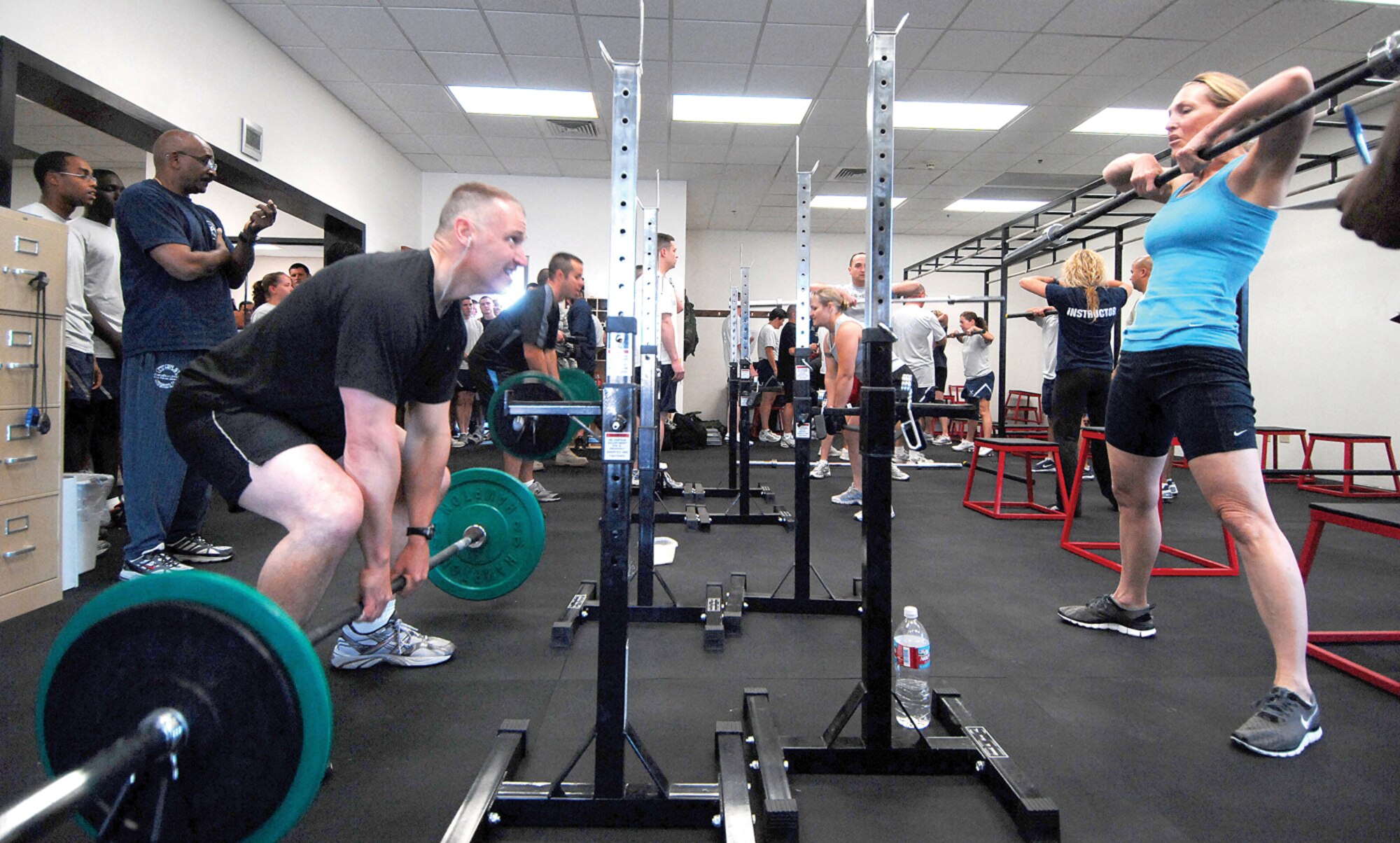 Brig. Gen. Kurt Neubauer, 56th Fighter Wing commander, and wife Sandy, compete during the CrossFit Challenge. (U.S. Air Force photo/ Tech. Sgt. Jeffery Wolfe.)
