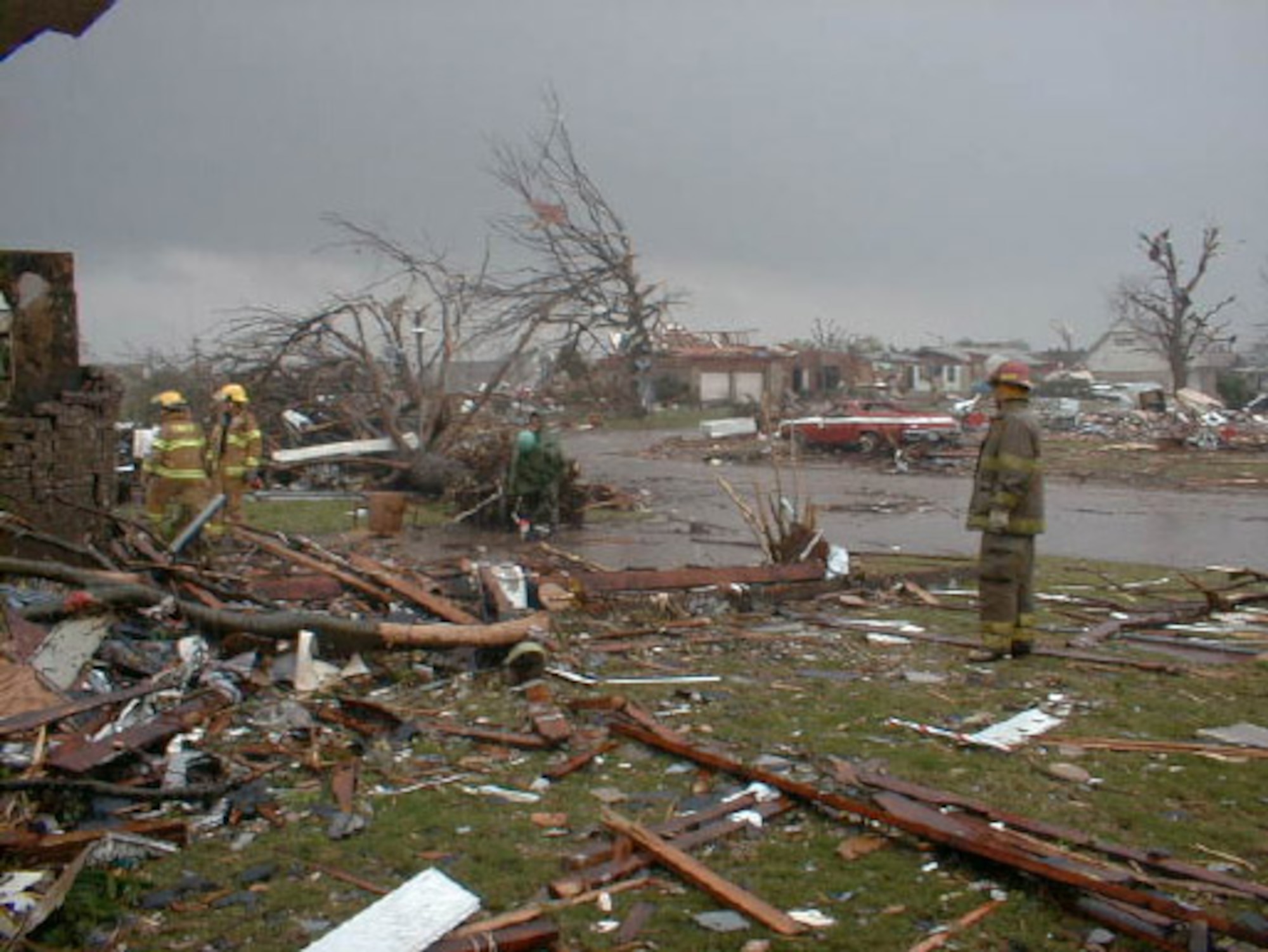 A Del City firefighter surveys damage that affected both the military and civilian community surrounding Tinker Air Force Base following the May 3, 1999 tornado. (1999 file photo)
