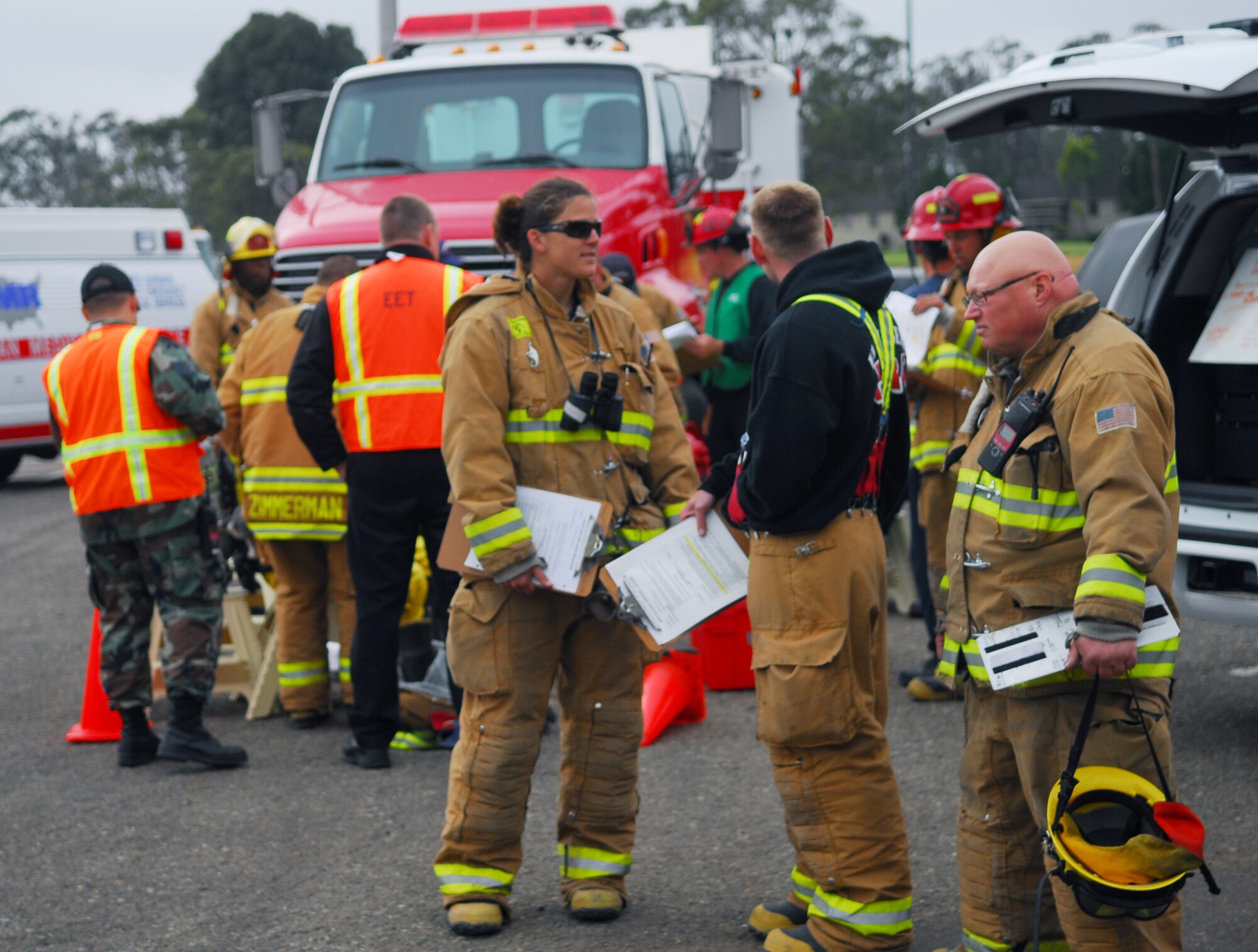 VANDENBERG AIR FORCE BASE, Calif.-- Firefighters of the 30th Civil Engineer Squadron respond to a simulated explosion here during the  Foggy Shores excercise April 22. Foggy Shores allows Airmen to experience intense scenerios to prepare for real world crisises. (U.S. Air Force photo / Senior Airman Christopher Hubenthal)