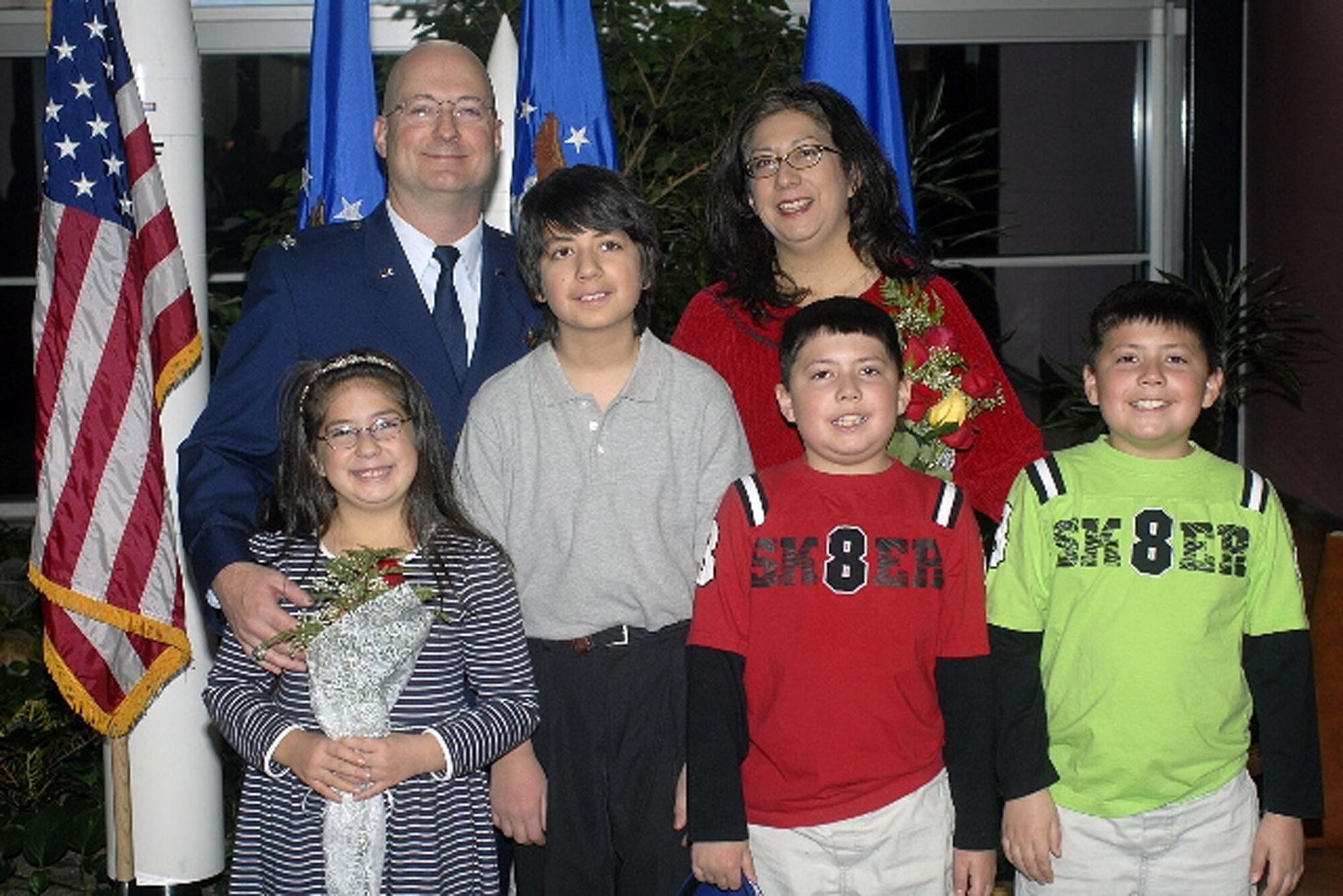 Col. Jeffrey Frankhouser and his wife, Elaine, along with their children, Avery, 8, Dane, 13, Paul and Grant, both 10, celebrate the colonel's pin-on ceremony at Peterson Air Force Base, Colo., December 2007. (U.S. Air Force courtesy photo)