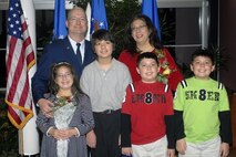 Col. Jeffrey Frankhouser and his wife, Elaine, along with their children, Avery, 8, Dane, 13, Paul and Grant, both 10, celebrate the colonel's pin-on ceremony at Peterson Air Force Base, Colo., December 2007. (U.S. Air Force courtesy photo)