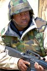 Staff Sgt. Broderick Smith stands guard in the Blue Thunder compound during Patriot Thunder. (U.S. Air Force photo by Jamie Pitcher)