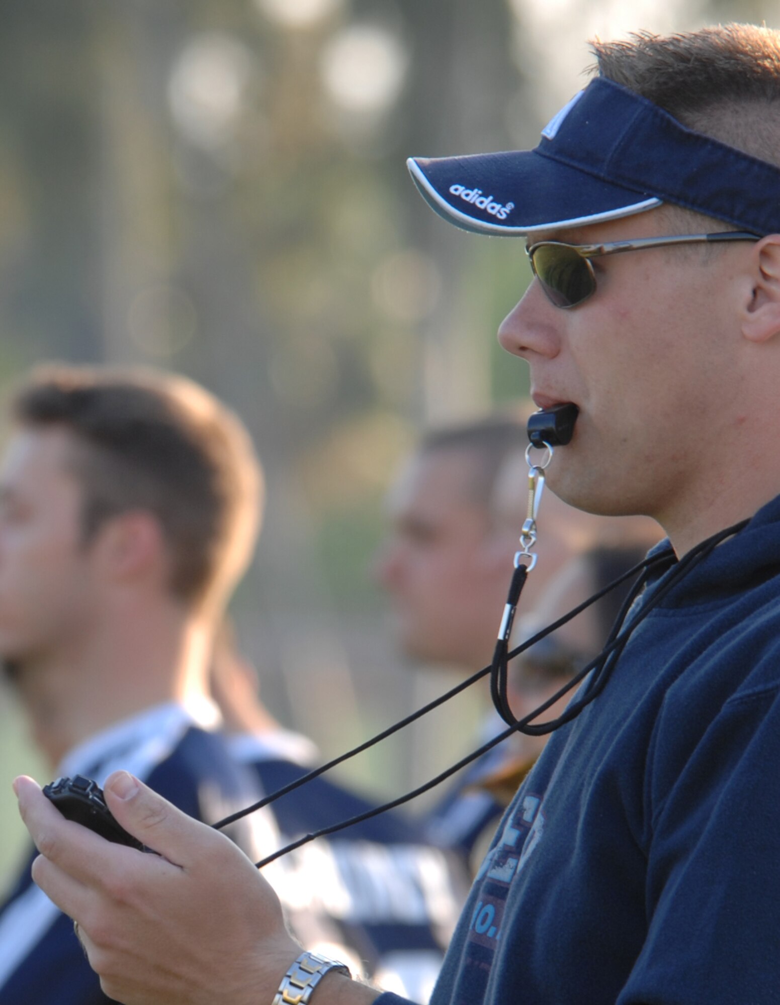 Staff Sgt. Justin Thibault, 39th Force Support Squadron prepares to blow the whistle on the first half of the Communications/Maintenance Squadron intramural soccer game. The game resulted in a tie score of 2-2. The intramurals are made up of nine squadron teams. (U.S. Air Force photo/Staff Sgt. Lauren Padden)