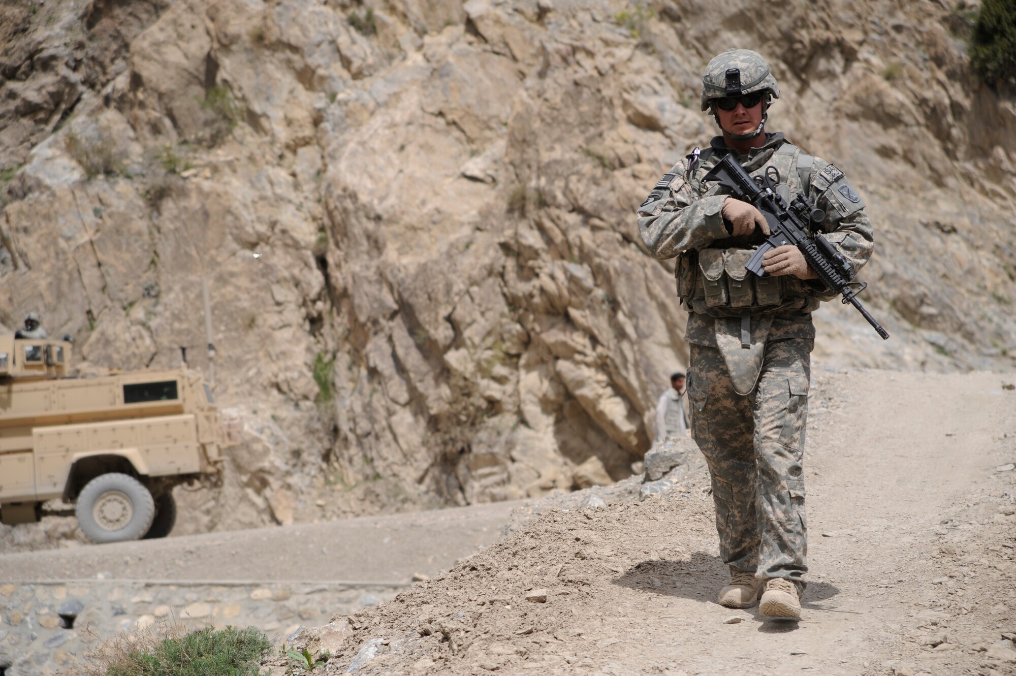 U.S. Air Force Senior Airman Michael Davidson, a combat medical technician with the Paktya Provincial Reconstruction Team, provides security during combat operations near Forward Operating Base Herrara, Afghanistan, April 16, 2009. (U.S. Air Force photo by Staff Sgt. Shawn Weismiller)