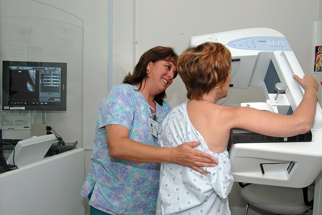 Ingrid Reinig, a mammography technologist at Naval Hospital Camp Pendleton, takes a mammogram of a patient with the hospital’s new digital system.  This upgrade will give providers enhanced images while exposing patients to less radiation resulting in improved health care.