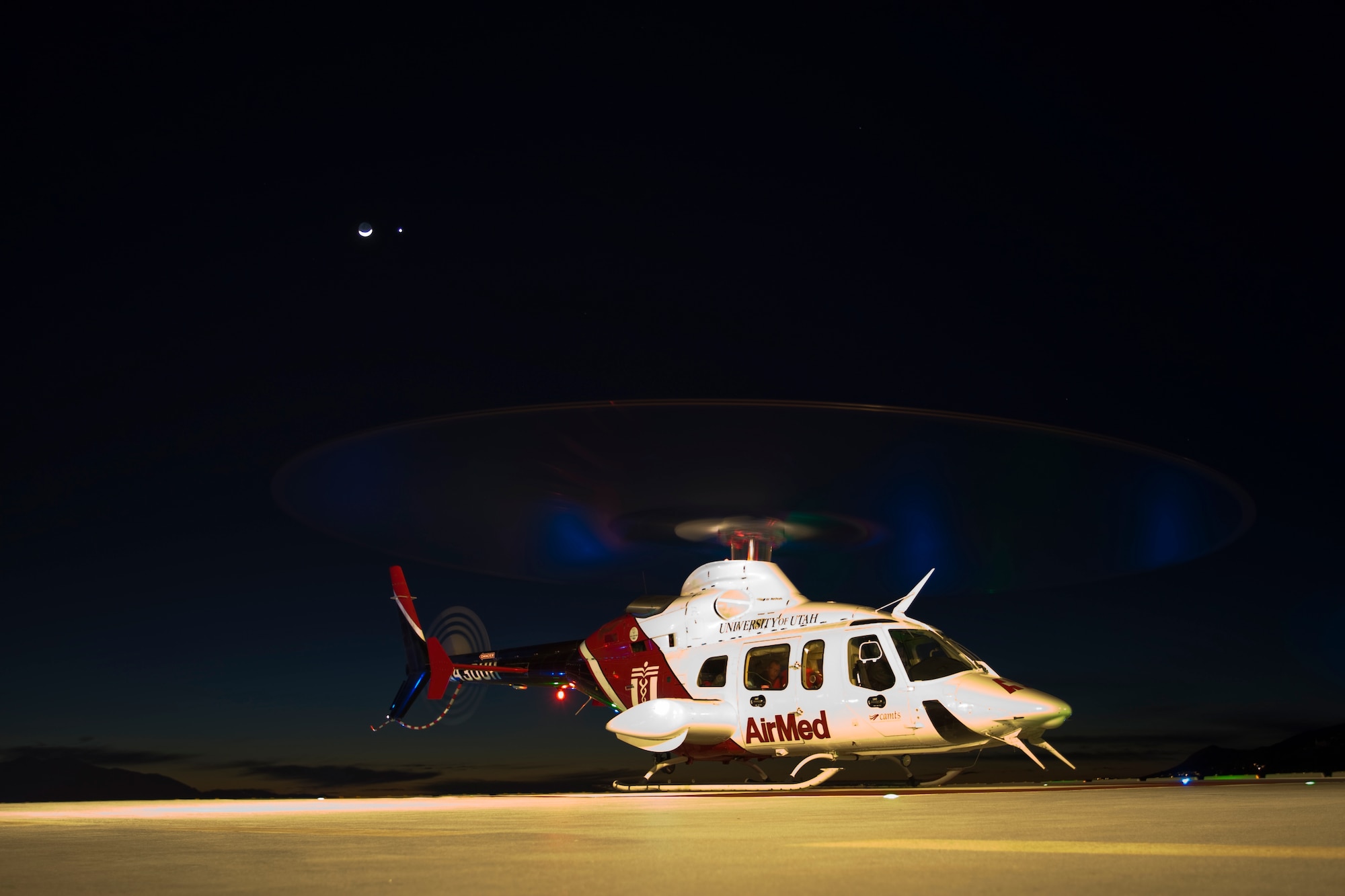 SALT LAKE CITY, Utah ? An AirMed Bell 430 helicopter lands at the University of Utah hospital after picking up a patient in Tooele, Utah.  Staff Sgt. Alan Reynolds of the 151st Medical Group recently participated in a ride-along mission with the local AirMed unit to observe their medics attend to critical-care situations.  Sergeant Reynolds is one of 19 Utah Air Guard medics who will have the opportunity to participate in the ride-along program.  U.S. Air Force photo by Tech. Sgt. Michael D. Evans



