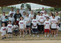 919th Special Operations Wing members and their families participated in the base fun run at Duke Field, May 2. Members were awarded prizes for completing challenges during the event as well as promoting health and fitness. Participants completed their trips around the track stopping at stations along the way to attempt fun challenges like jumping rope, playing with a hula-hoop, and doing push-ups. (U.S. Air Force photo/Staff Sgt. Jon McCallum)
