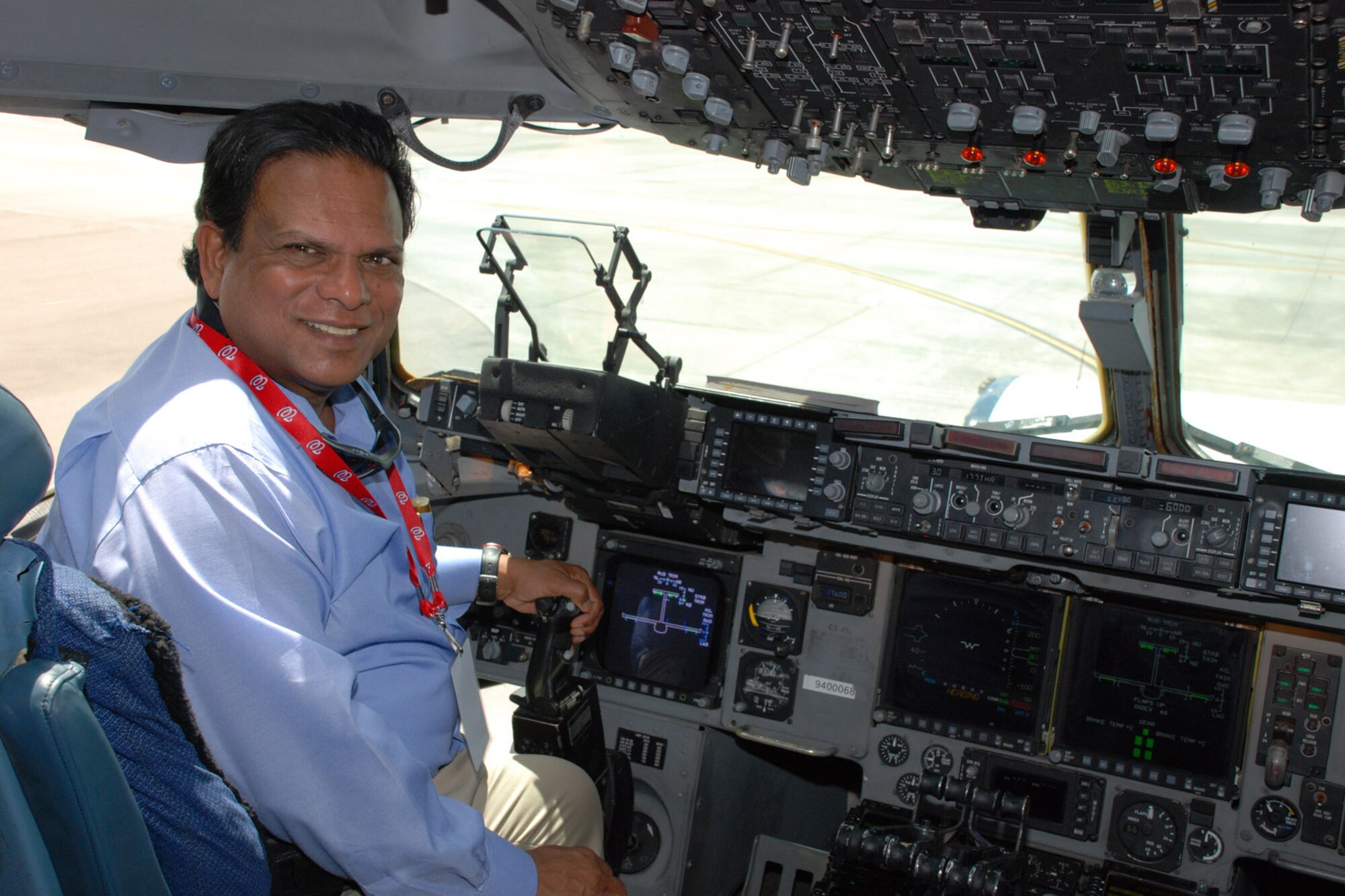 CHARLESTON AIR FORCE BASE, S.C. -- Judge Alli Maheed, from the 8th Judicial Circuit Court in Viera, Fla. checks out the pilot seat in a C-17 cargo aircraft during the 920th Rescue Wing's Civic Leader tour there April 28. Judge Maheed joined about 34 other Patrick Air Force Base-area civic leaders on the trip designed to offer them a glimpse at how seemlessly the active duty Air Force and Air Force Reserve personnel operate in today's joint training environment. U.S. Air Force photo/Master Sgt. Bryan Ripple