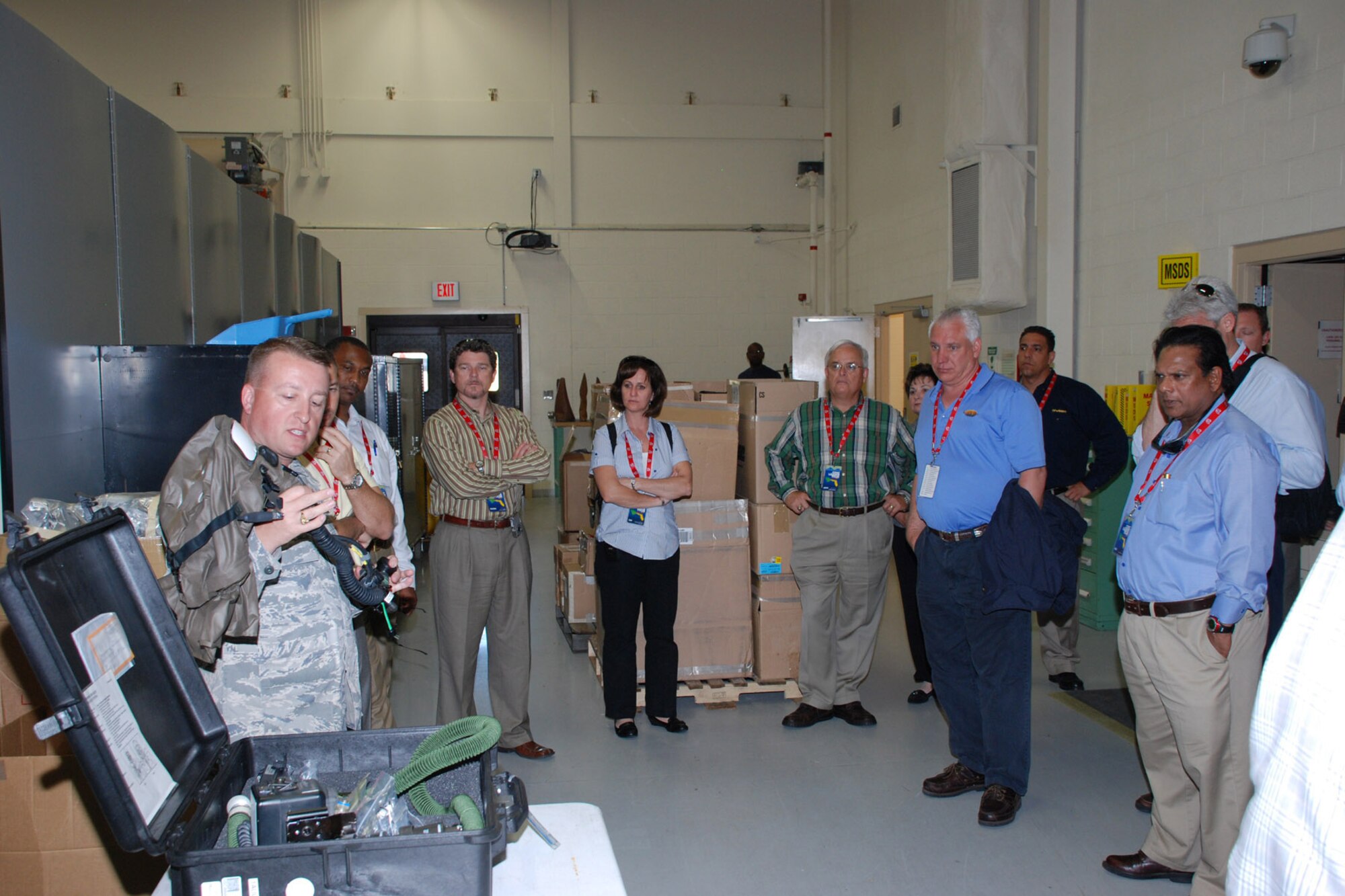 CHARLESTON AIR FORCE BASE, S.C. --Thirty five community and business leaders from the Patrick Air Force Base-area participated in a civic leader tour from Patrick AFB to Charleson AFB, S.C. April 28. The tour was designed to offer the tour participants a glimpse at how seemlessly active duty Air Force and Air Force Reserve personnel operate in today's joint training environment. The Air Force Reserve's 315th Airlift Wing flies C-17 aircraft along with the active duty 437th Airlift Wing at Charleston. Here the group receives a briefing from a aircrew flight equipment shop supervisor about aicrew life support equipment. U.S. Air Force photo/Master Sgt. Bryan Ripple